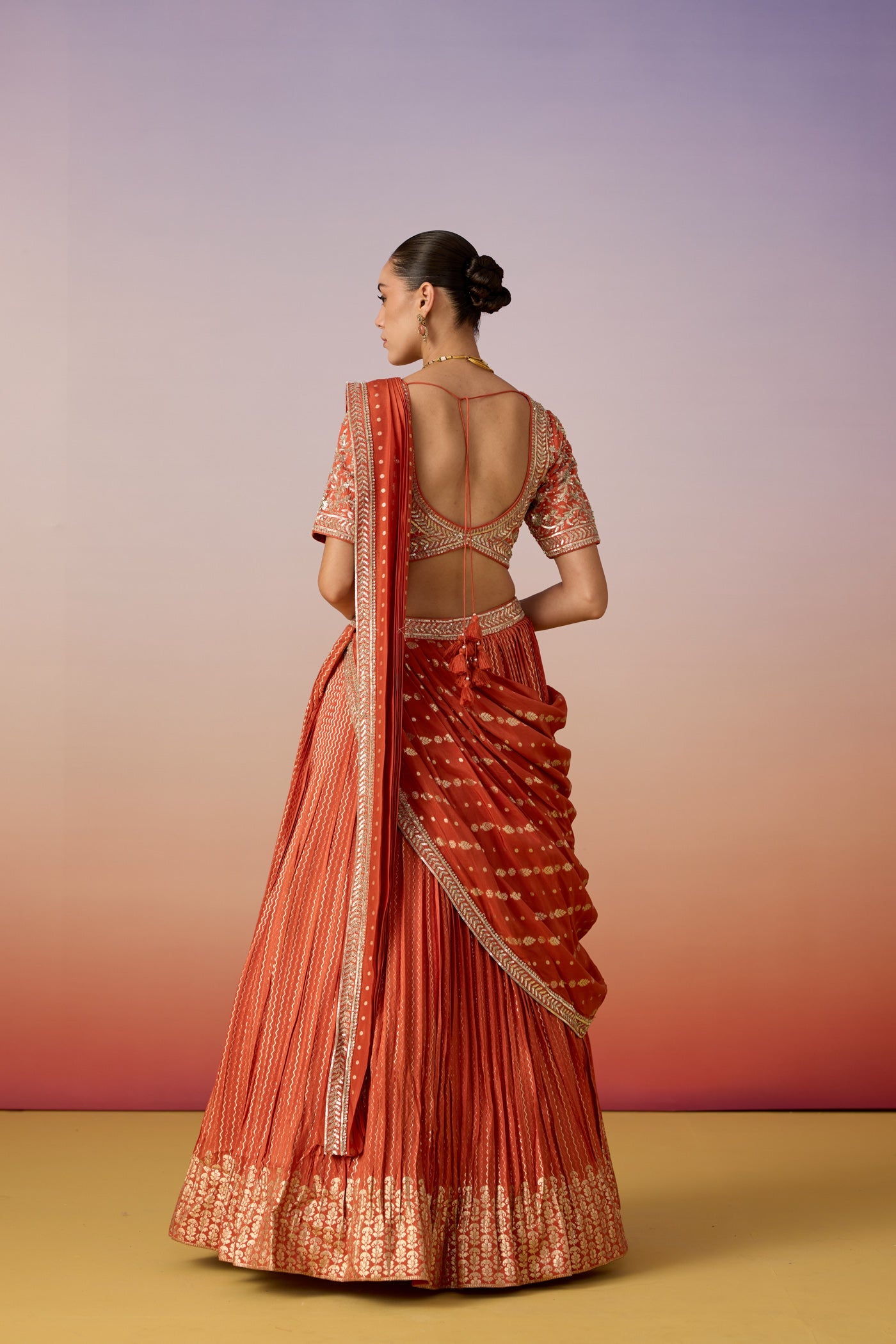 Rust Orange Embellished Crushed Silk Lehenga Set