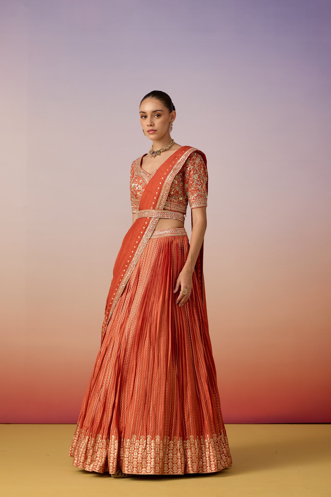 Rust Orange Embellished Crushed Silk Lehenga Set