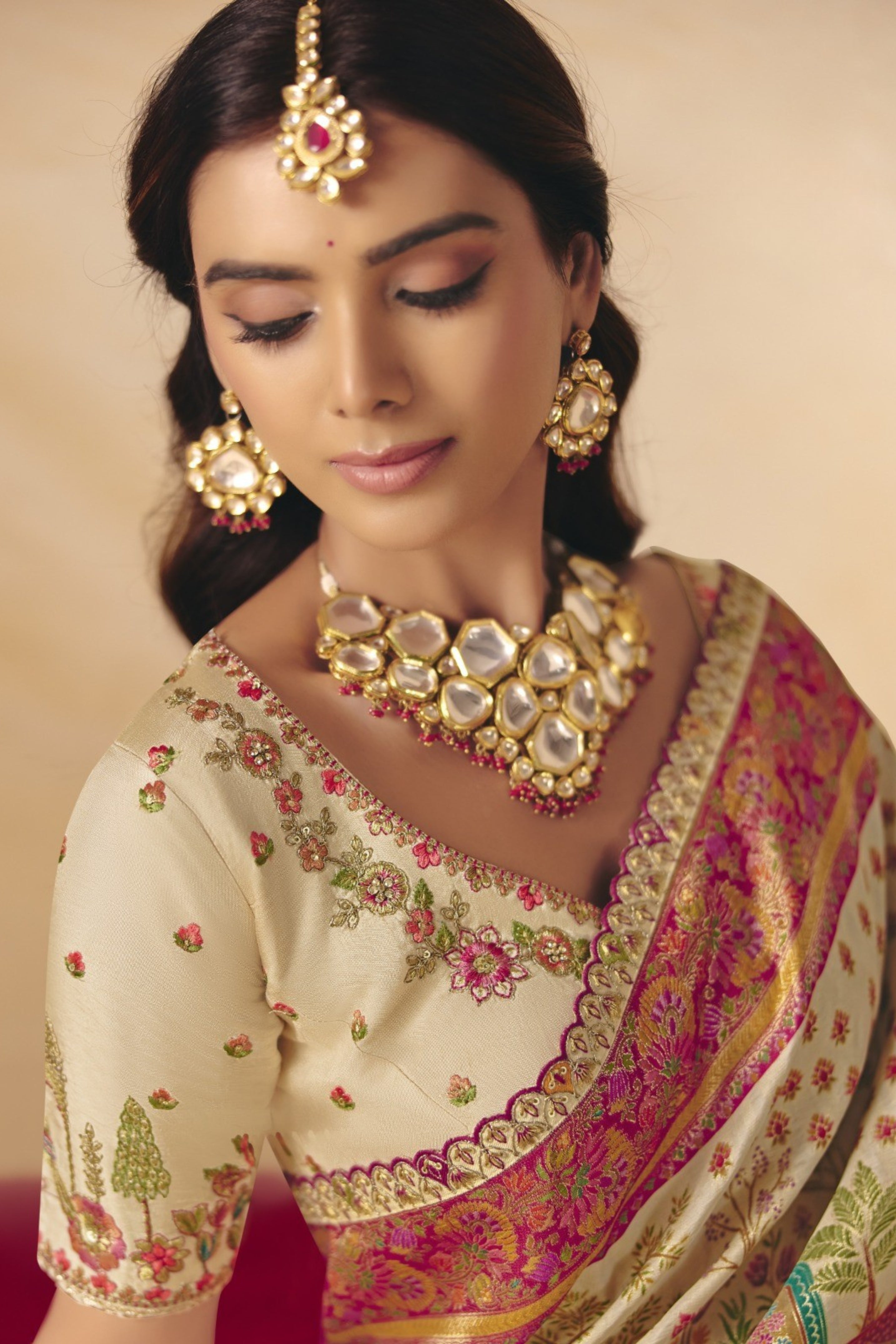 Creamy Beige Embellished Dola Silk Saree