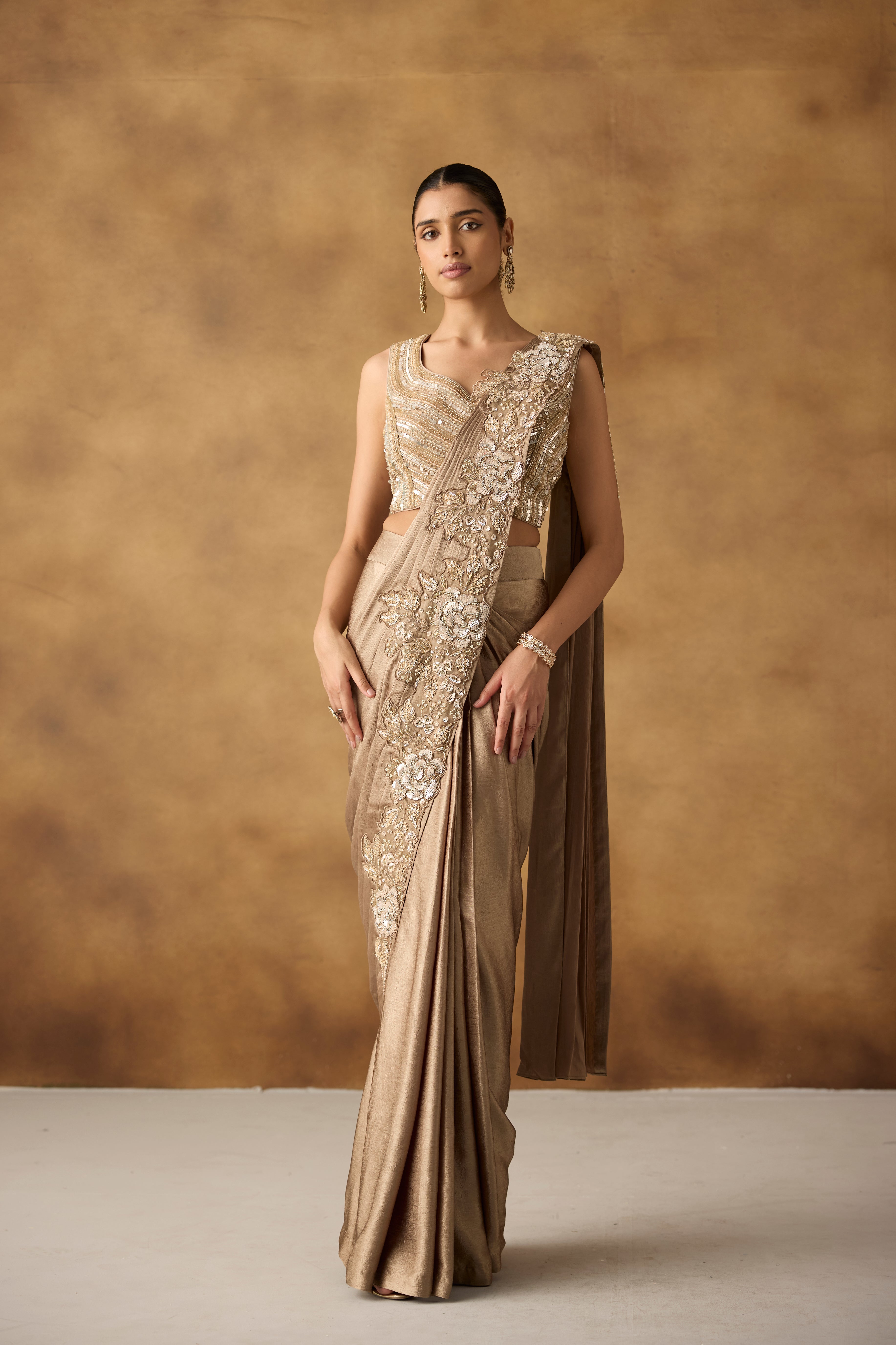 Metallic Gold Embellished Crepe Silk Draped Saree