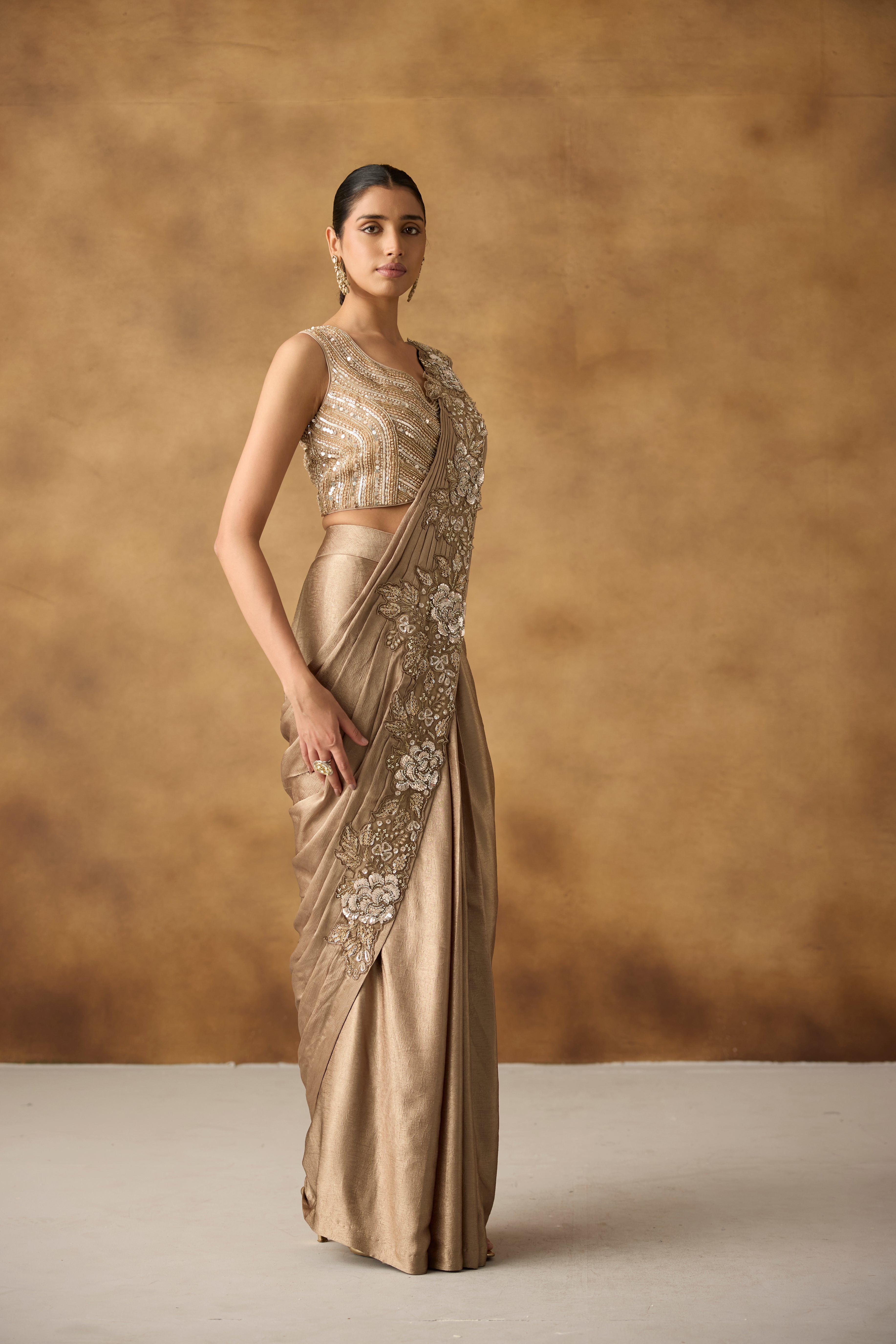 Metallic Gold Embellished Crepe Silk Draped Saree