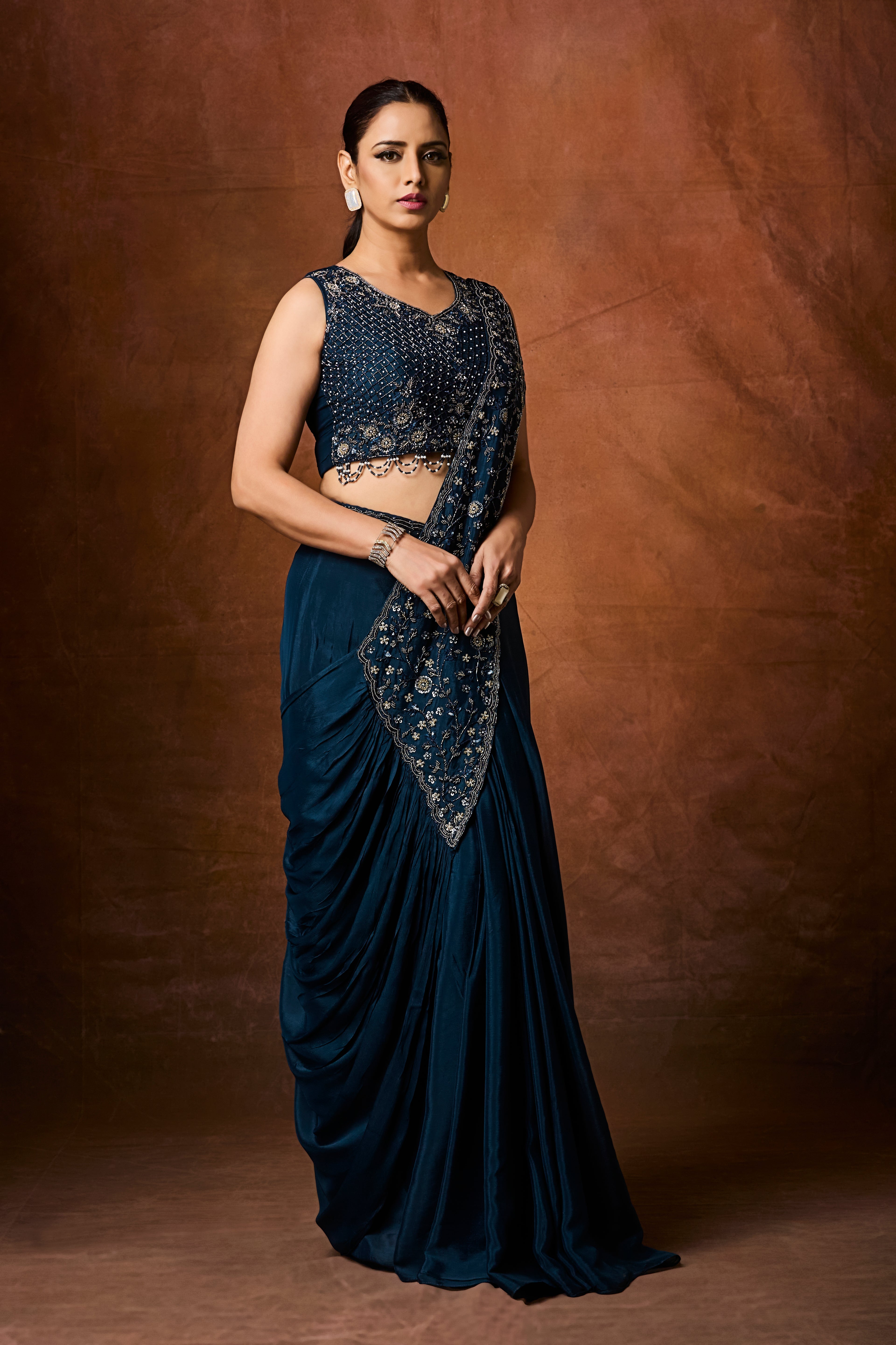 Navy Teal Embellished Crepe Silk Drape Saree
