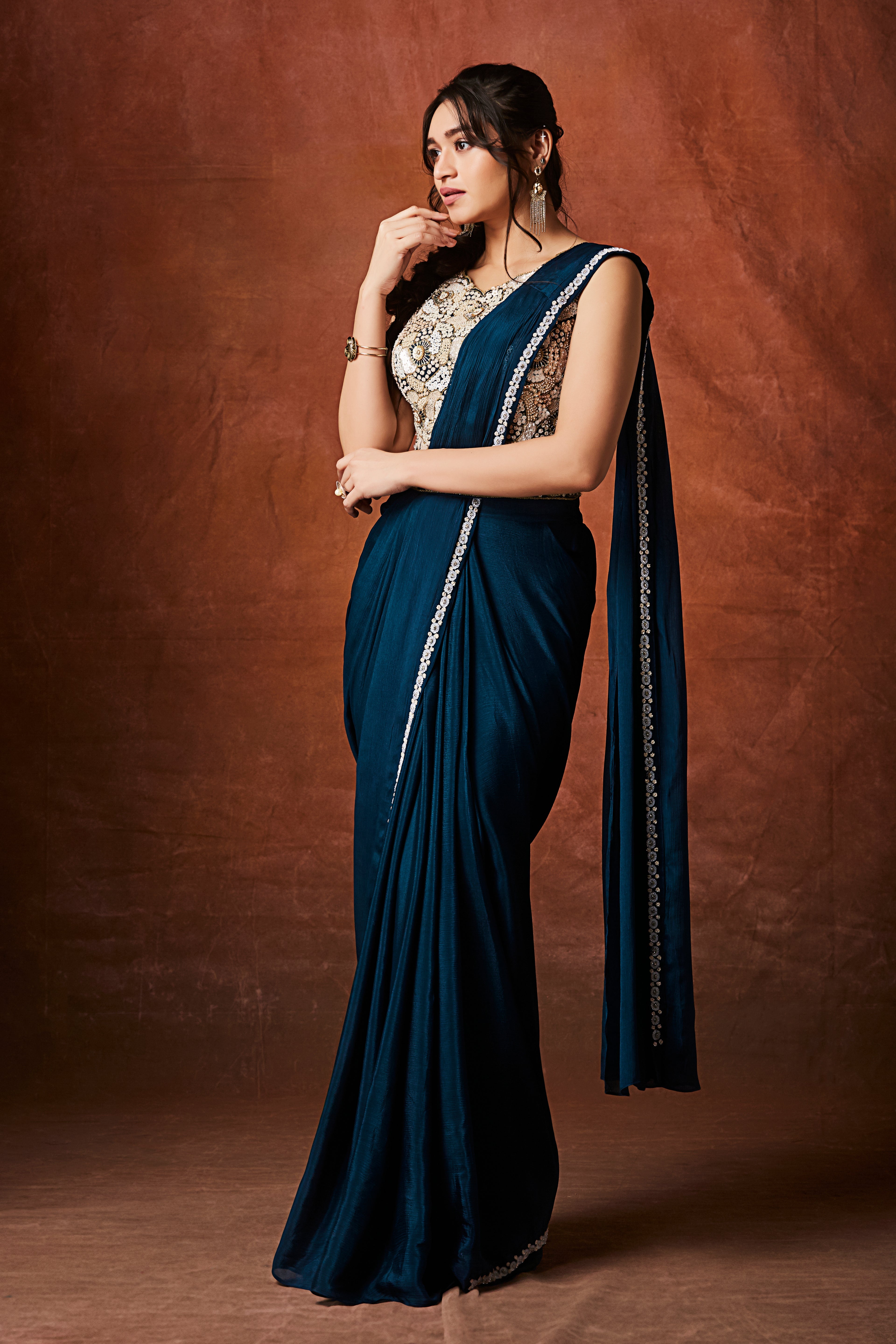Rich Teal Embellished Chinon Silk Drape Saree