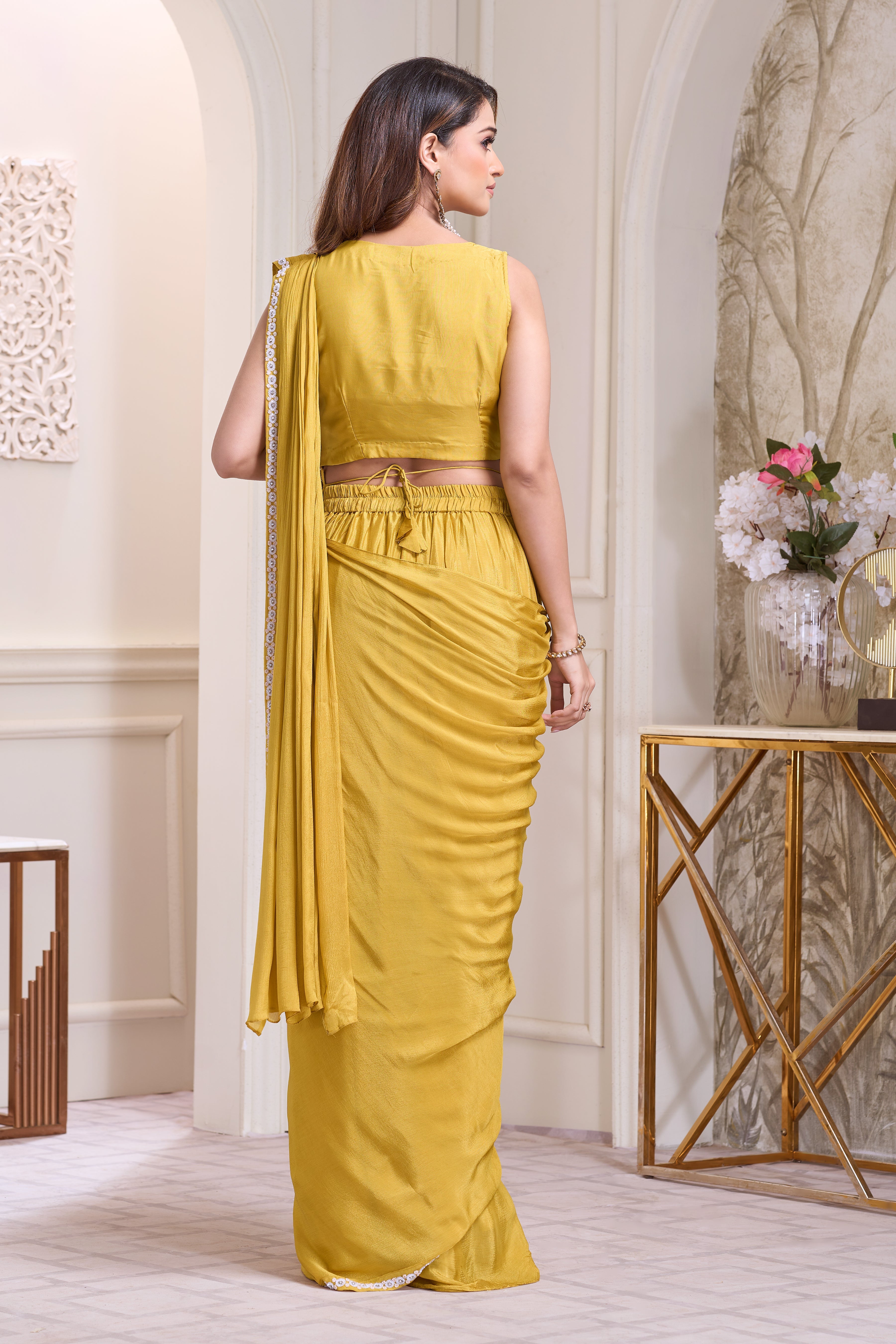 Vibrant Marigold Embellished Chinon Silk Drape Saree