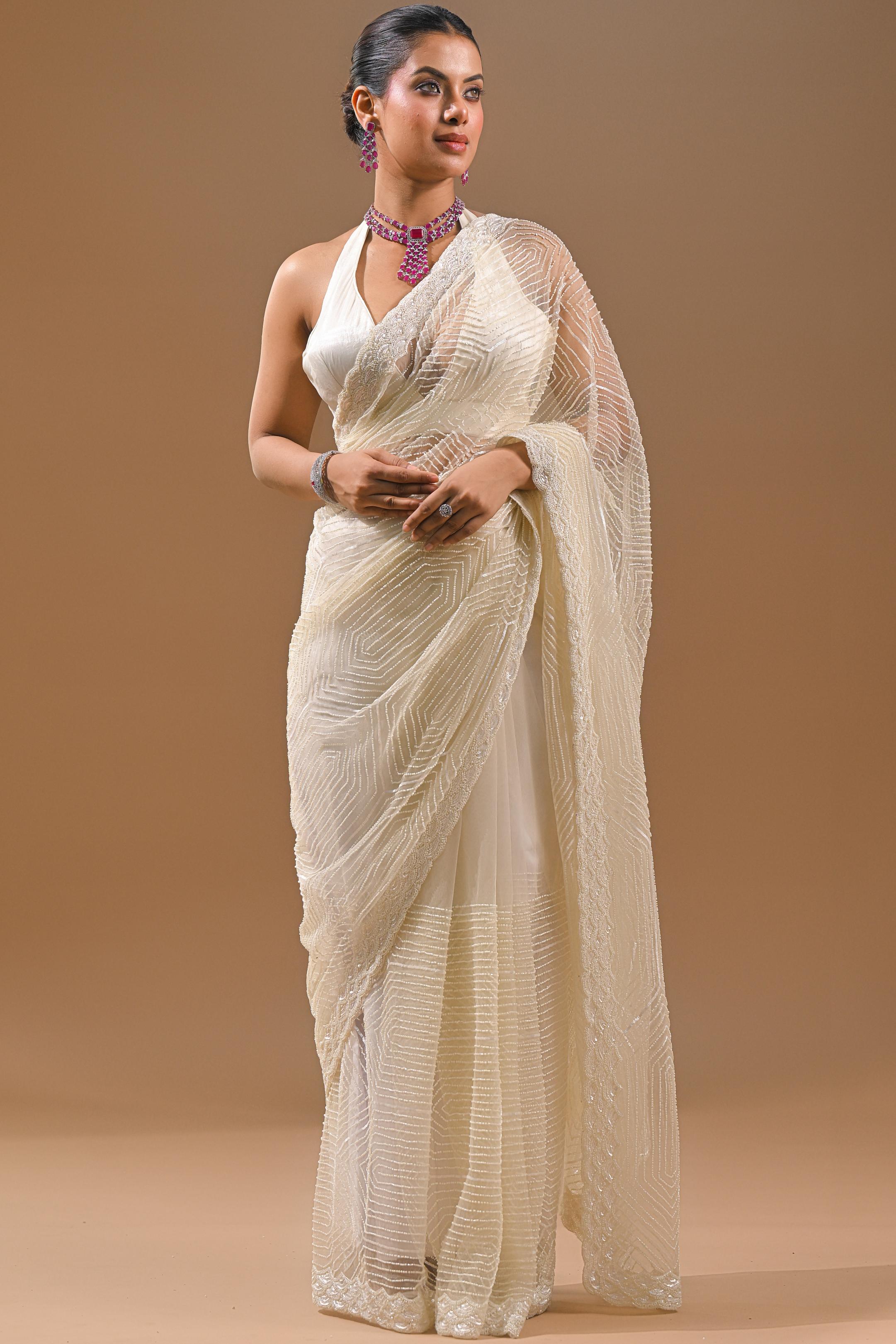 Cream Sequins Embellished Net Saree