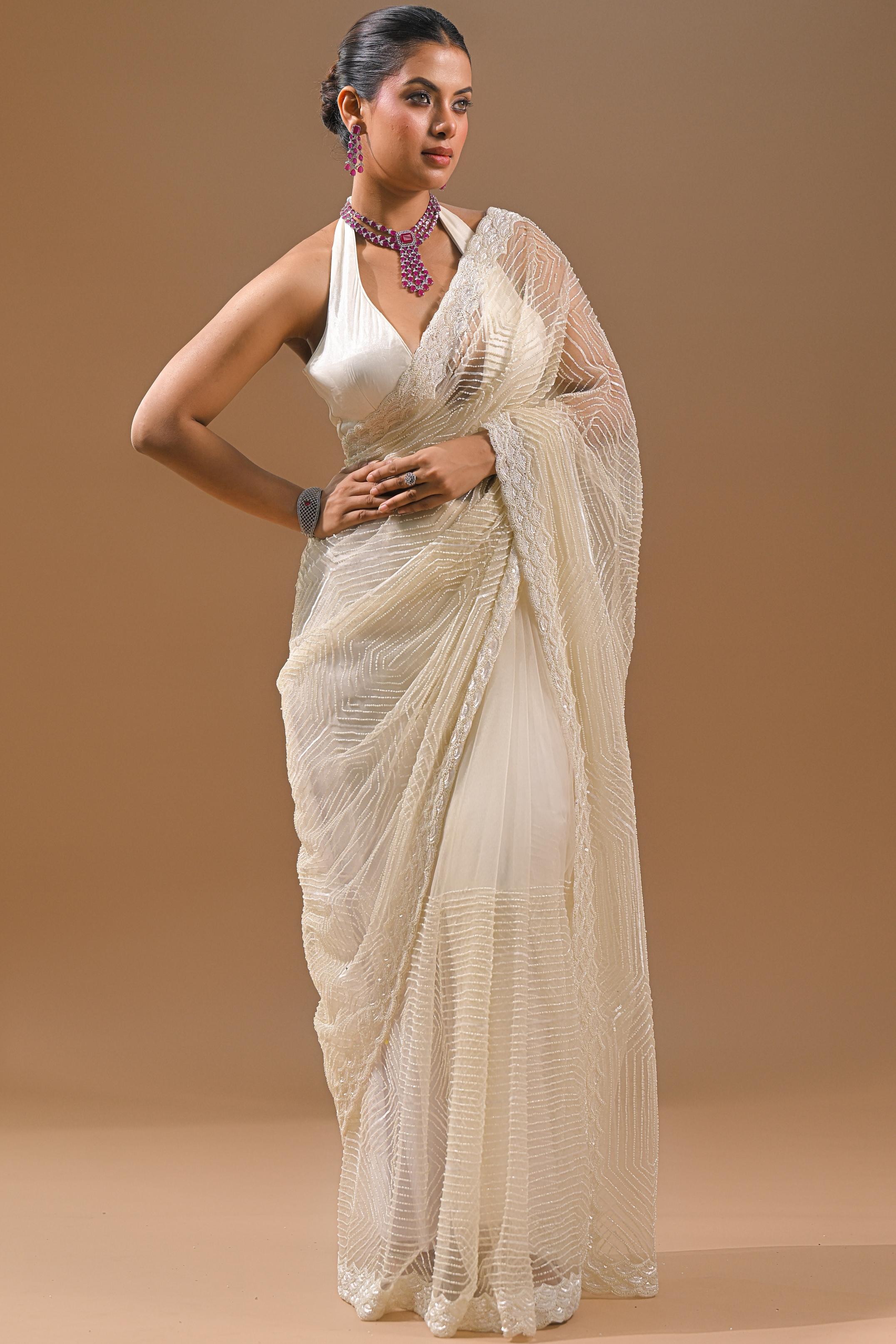 Cream Sequins Embellished Net Saree