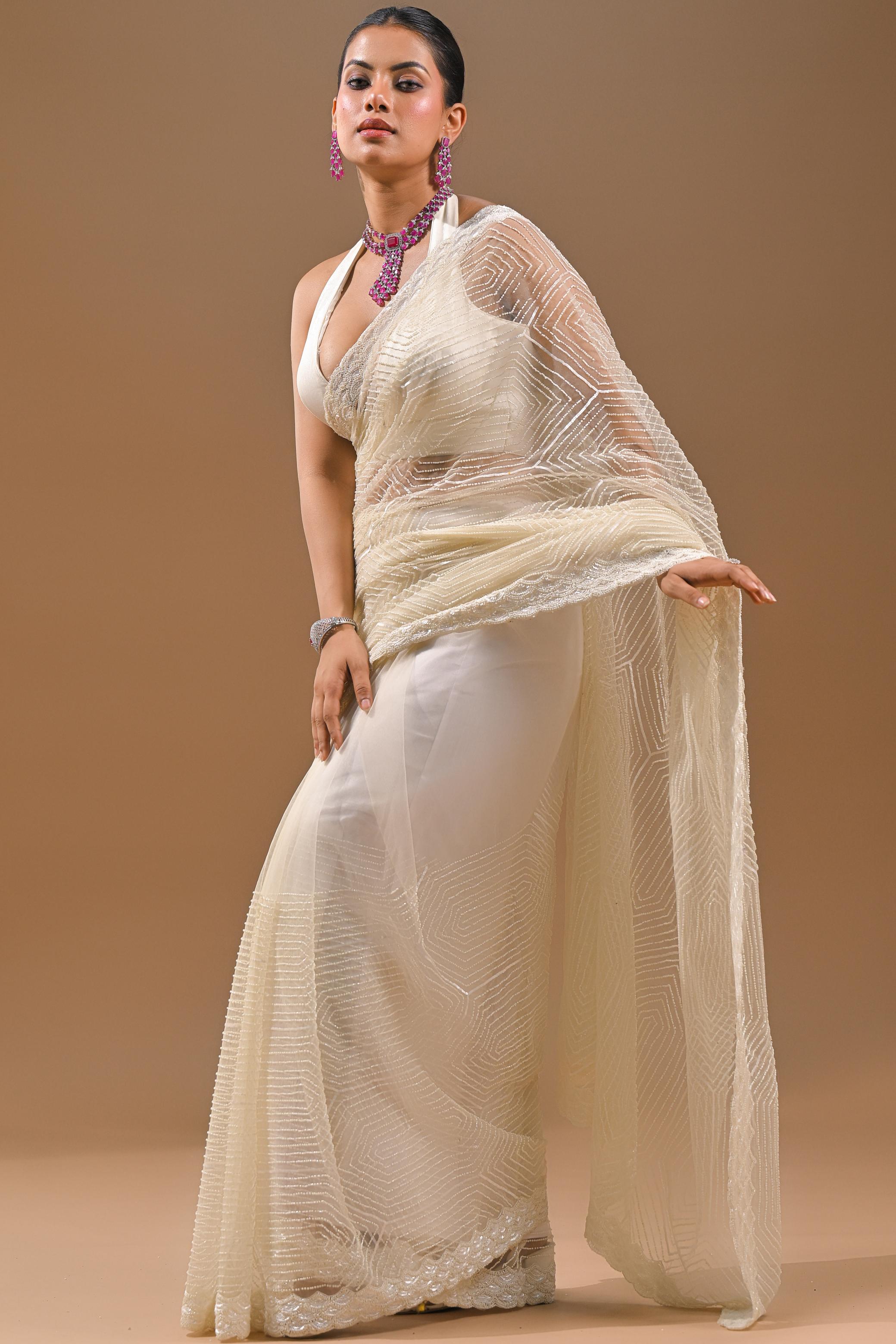 Cream Sequins Embellished Net Saree