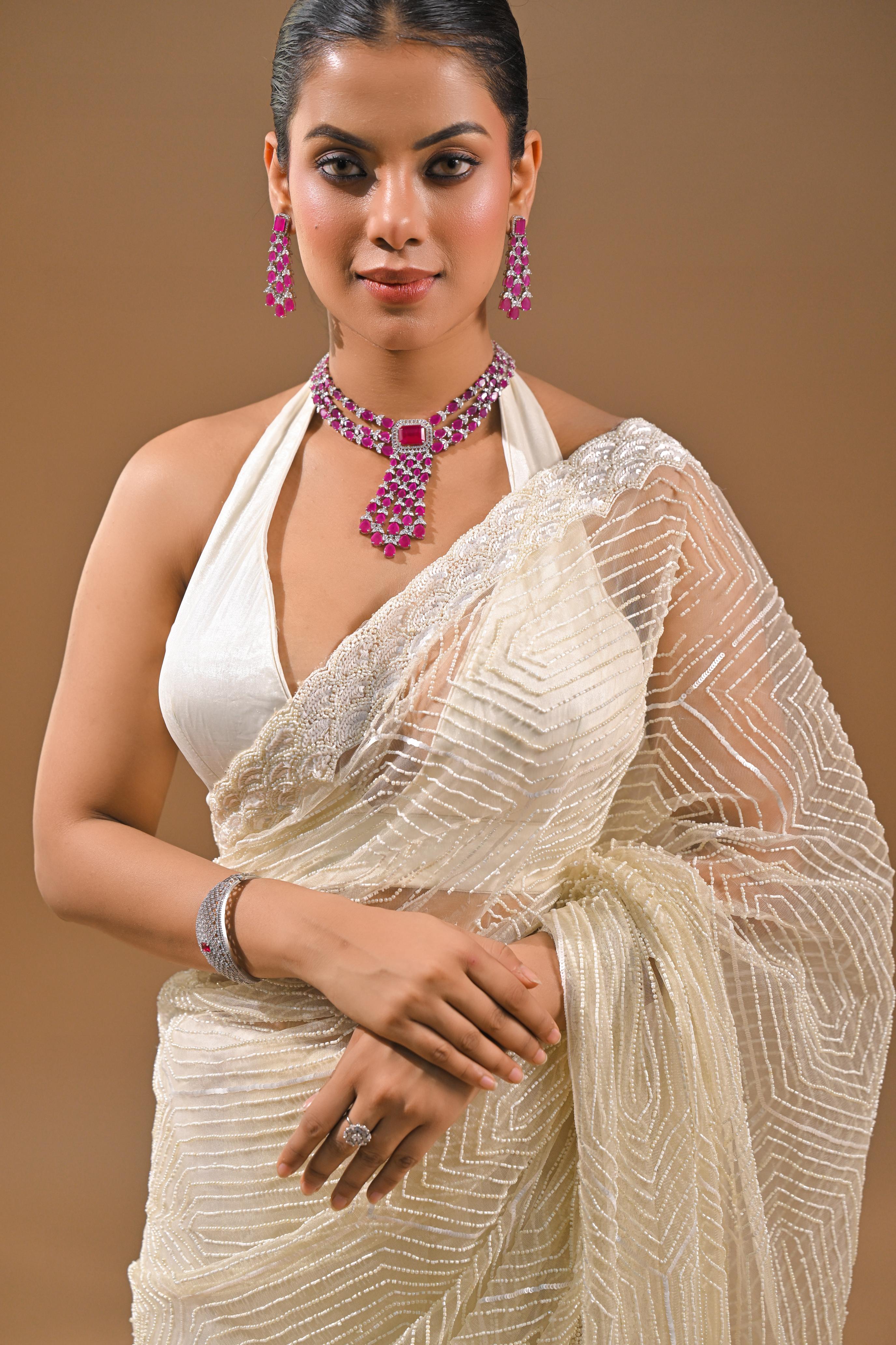 Cream Sequins Embellished Net Saree