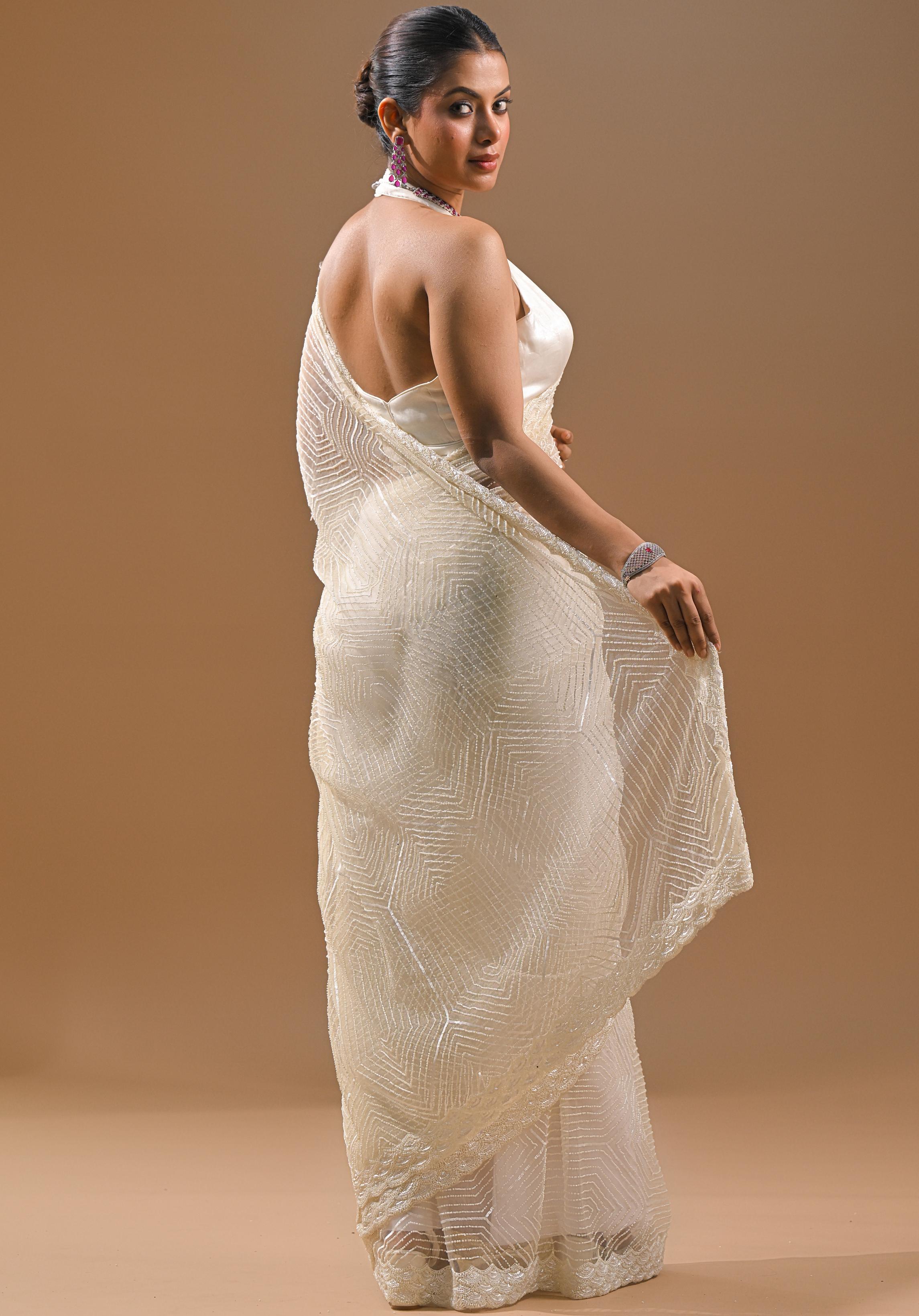 Cream Sequins Embellished Net Saree