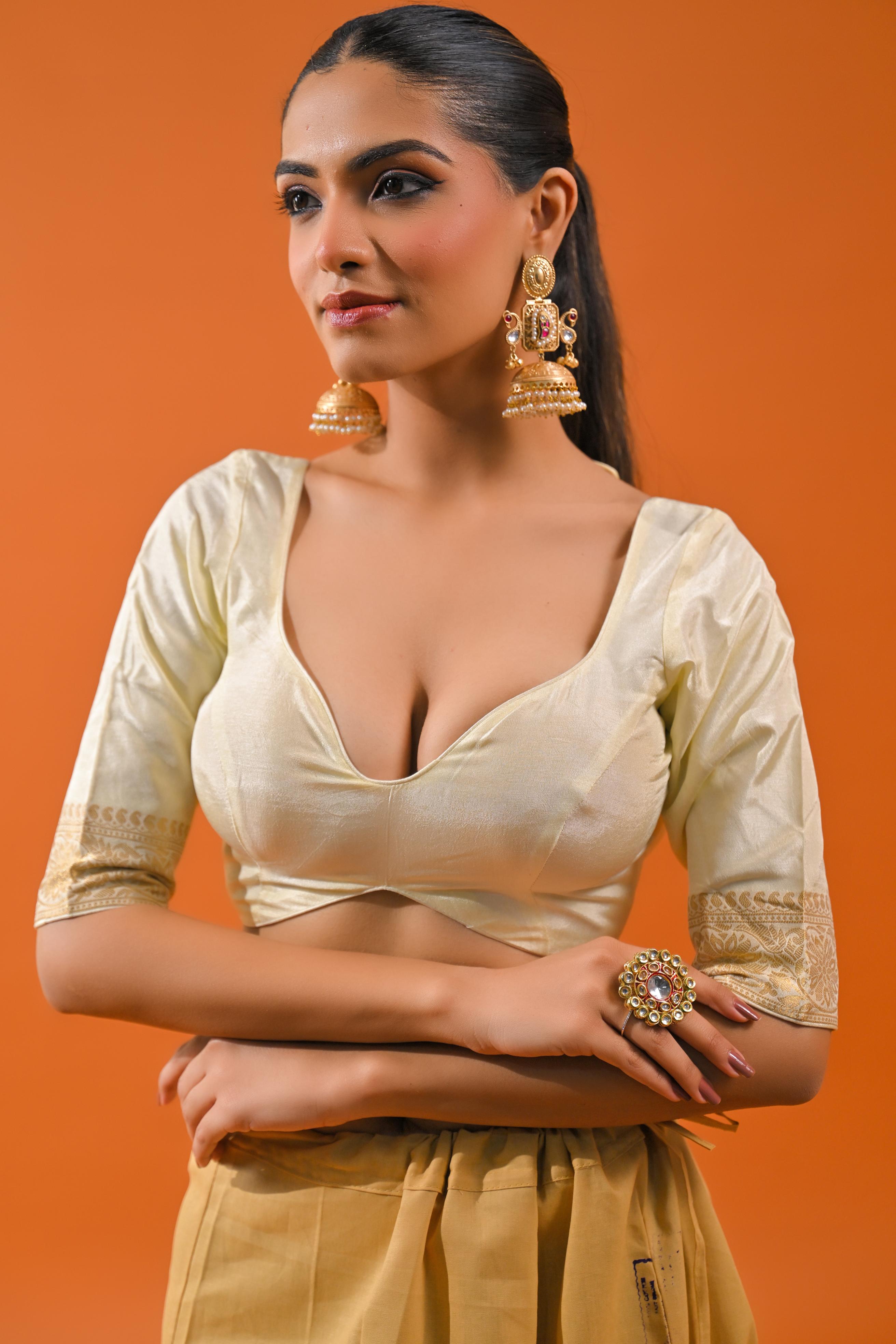 Bright Cream Embroidered Dola Silk Saree