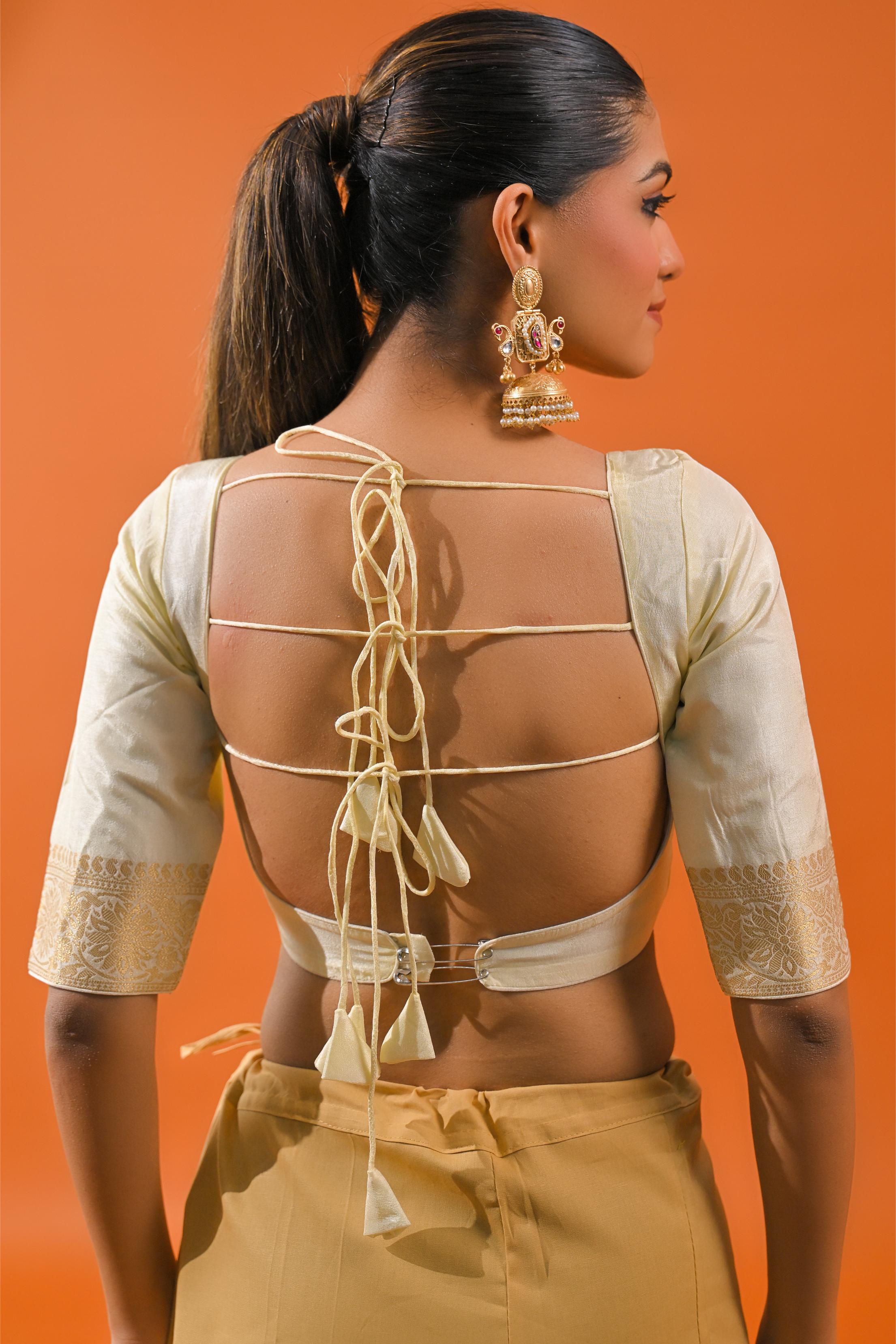 Bright Cream Embroidered Dola Silk Saree