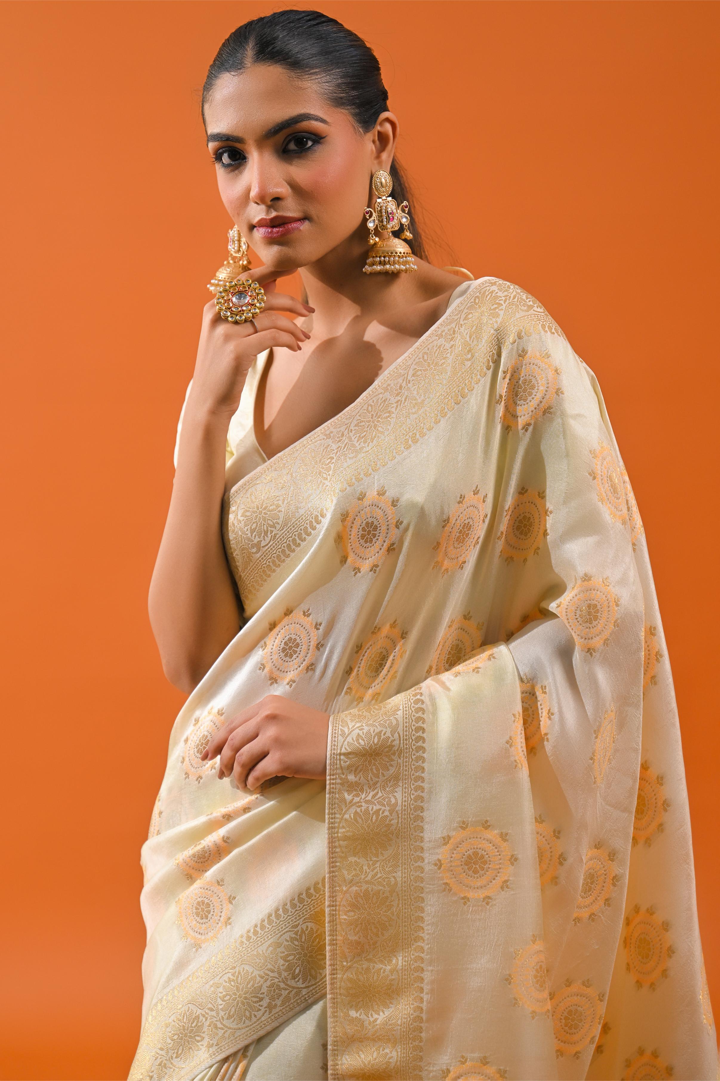 Bright Cream Embroidered Dola Silk Saree