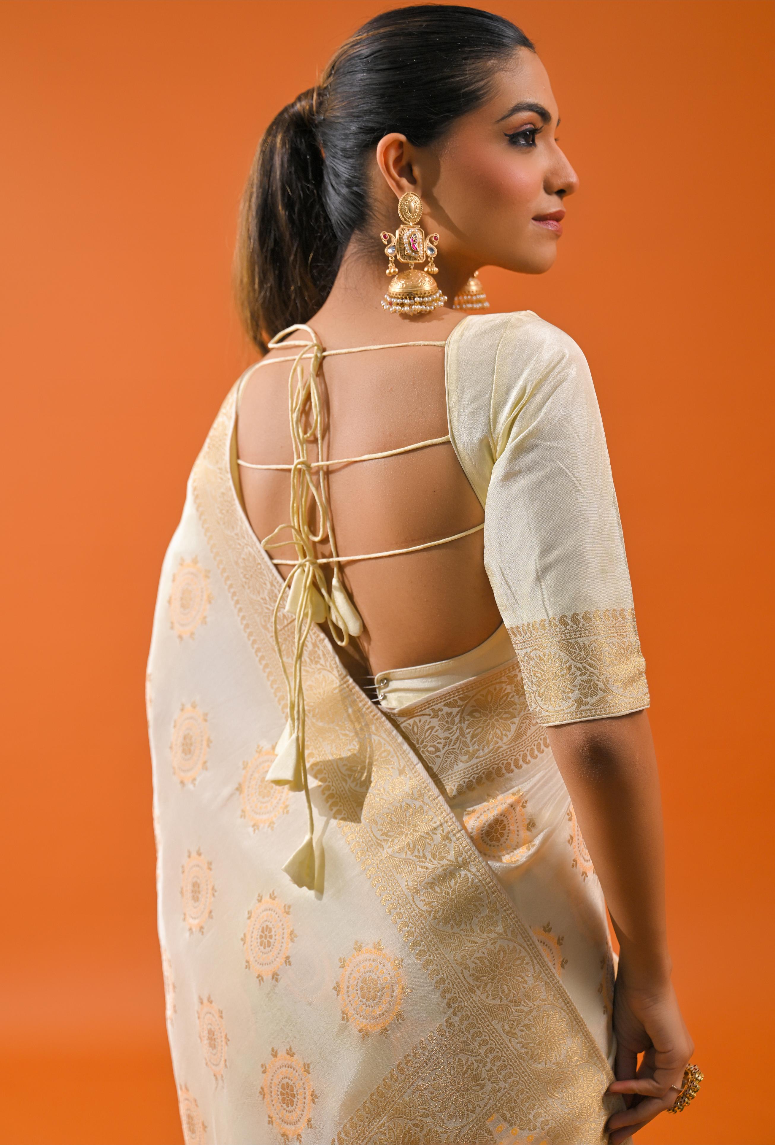 Bright Cream Embroidered Dola Silk Saree