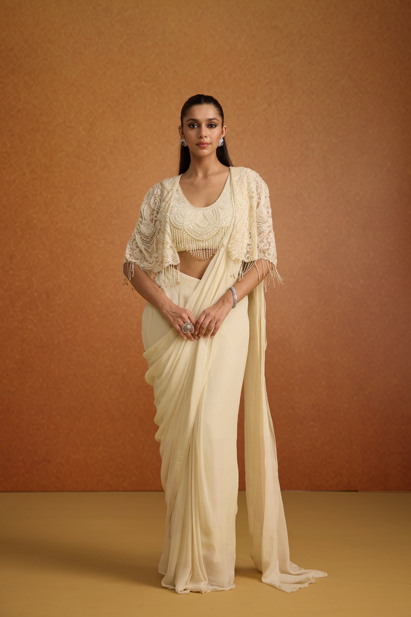 Ivory Embellished Soft Georgette Pre-Draped Saree
