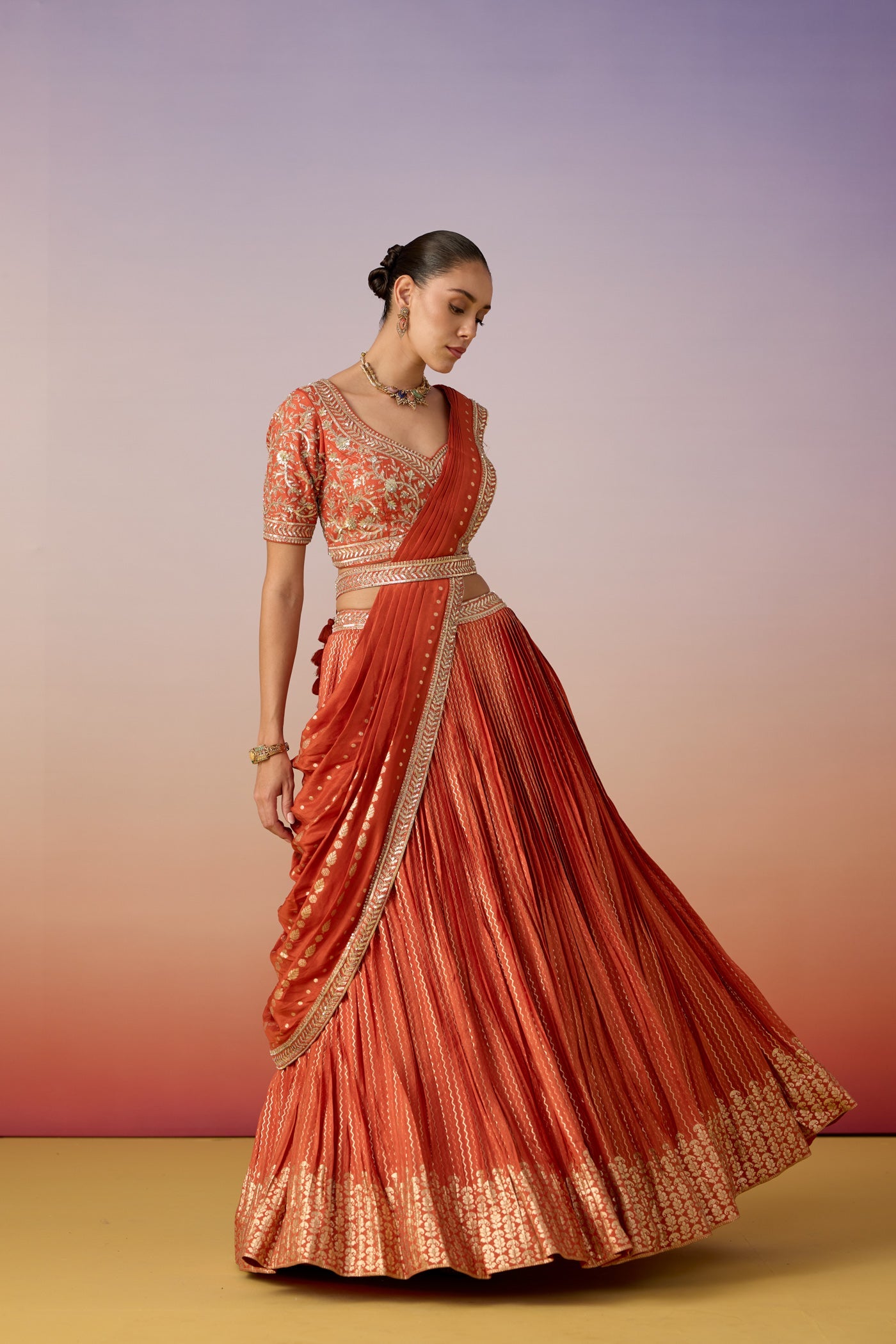 Rust Orange Embellished Crushed Silk Lehenga Set