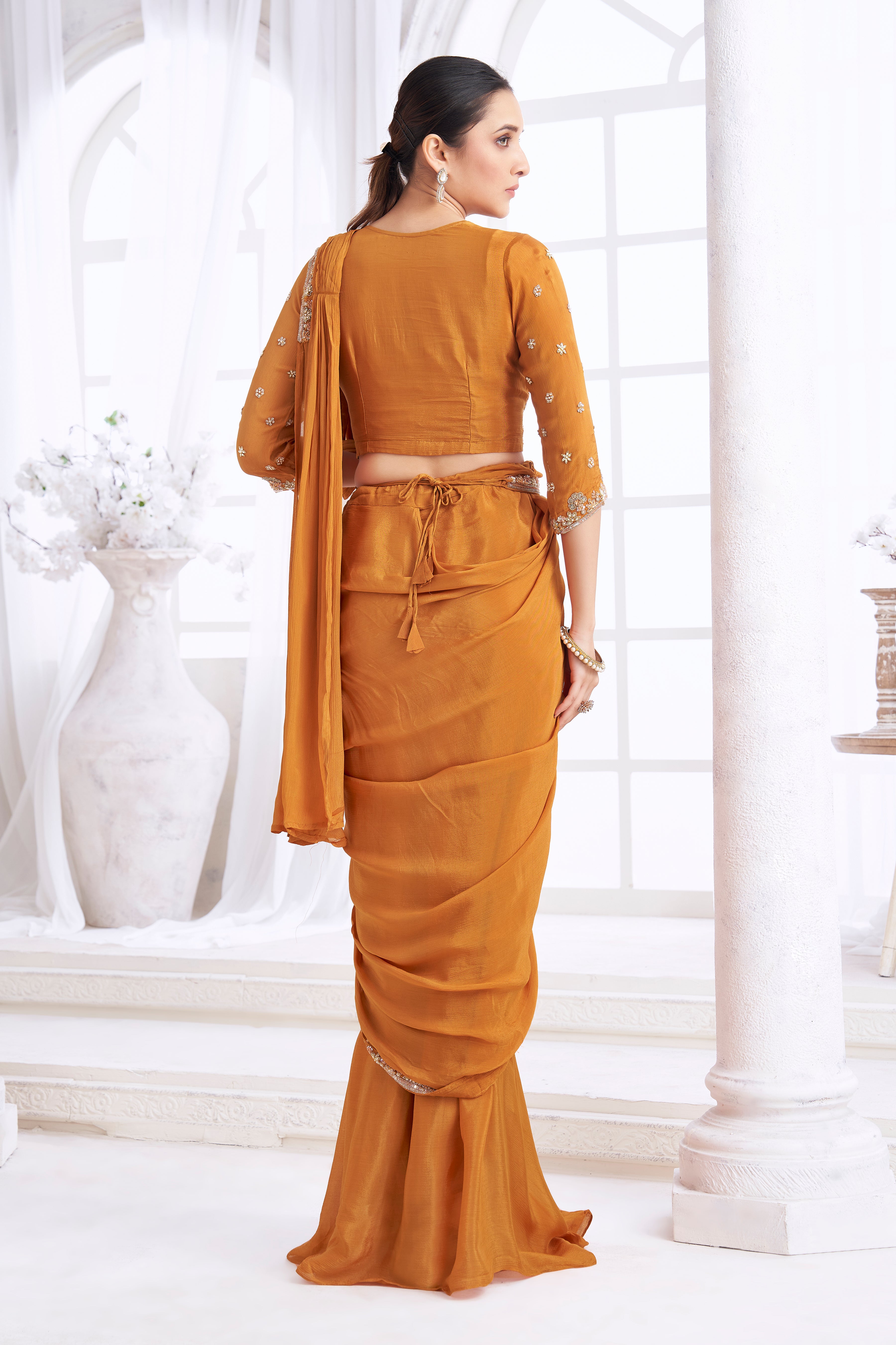 Deep Turmeric Embellished  Crepe Silk Drape Saree