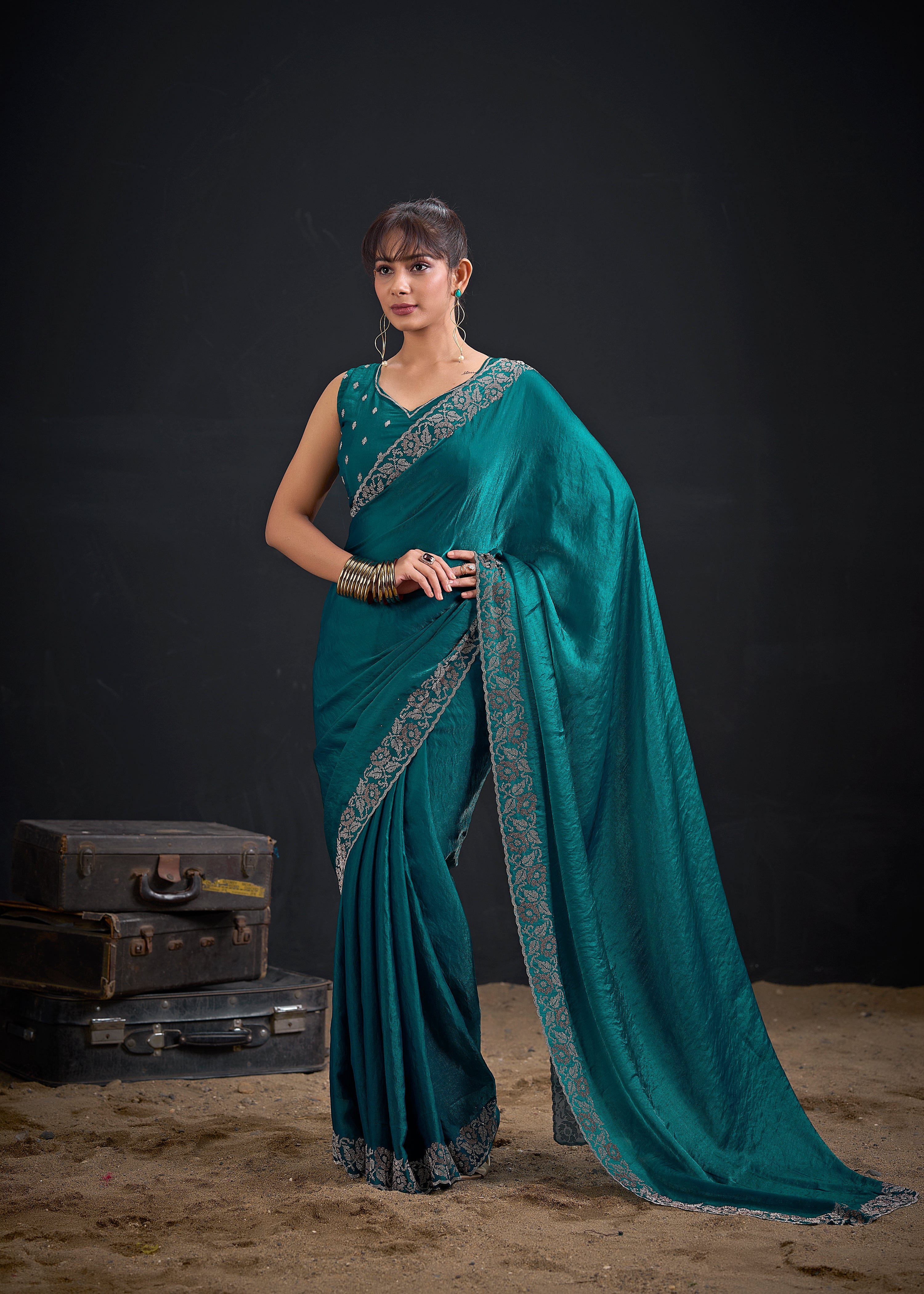 Opulent Blue Embellished Satin Silk Saree