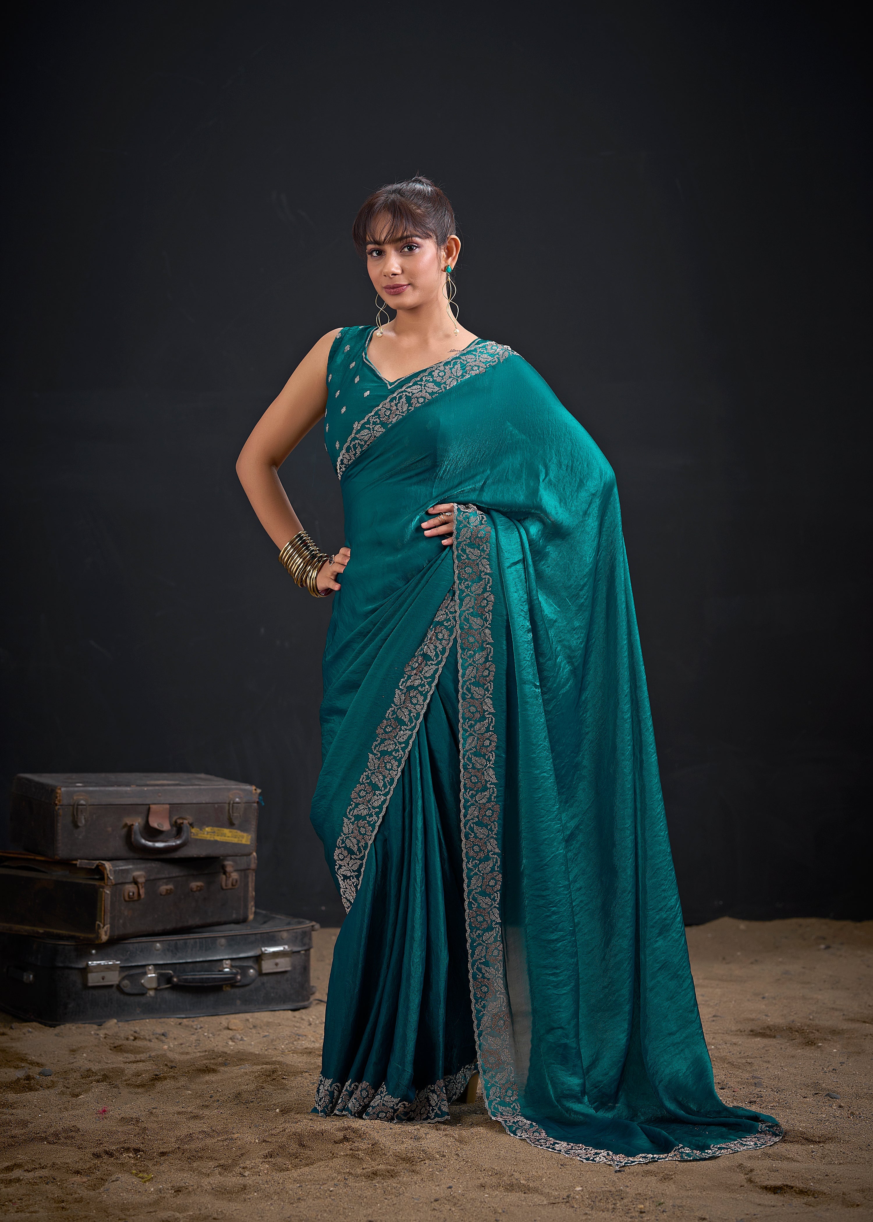 Opulent Blue Embellished Satin Silk Saree