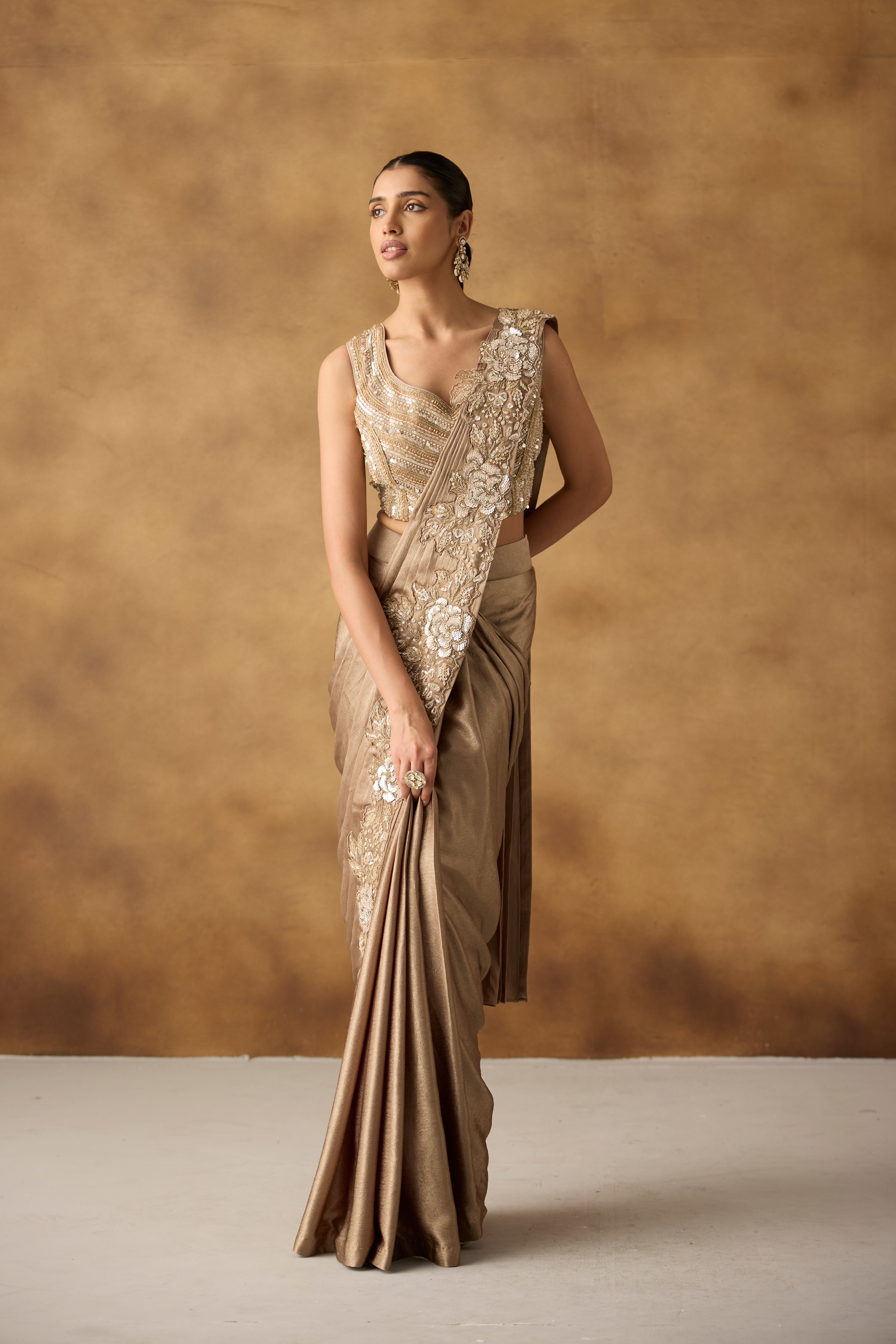 Metallic Gold Embellished Crepe Silk Draped Saree