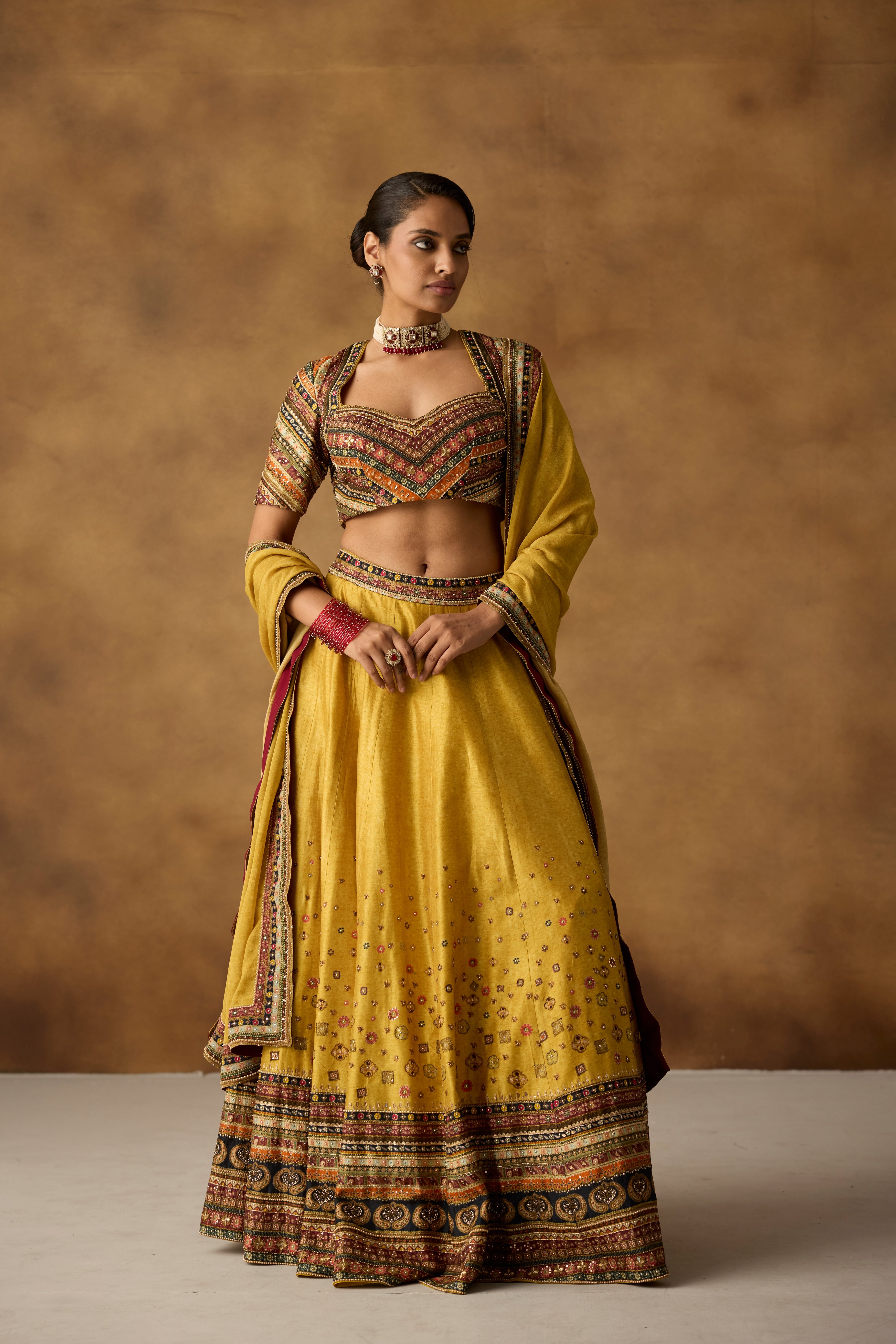 Mustard Yellow Embellished Dola Silk Lehenga Set