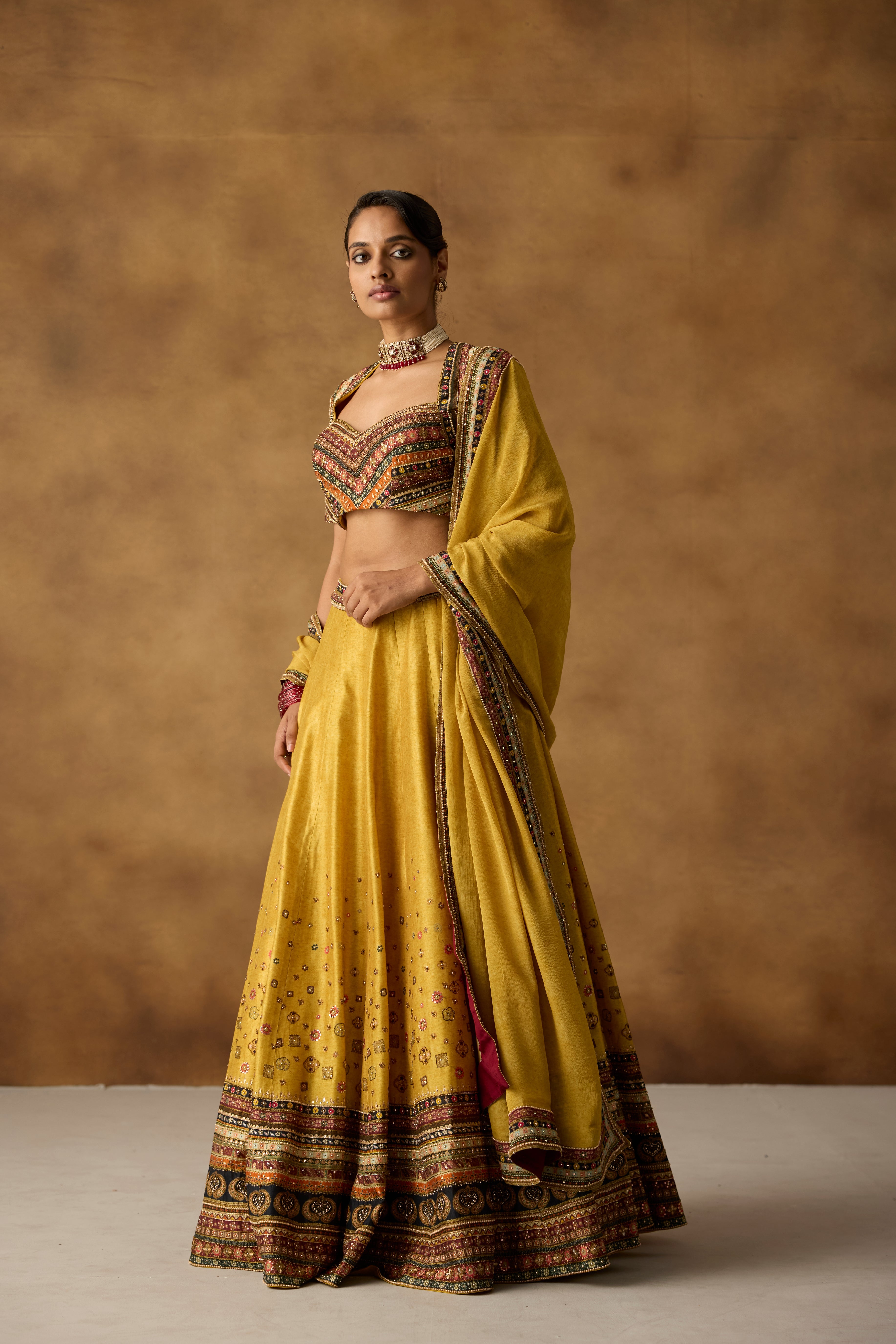 Mustard Yellow Embellished Dola Silk Lehenga Set