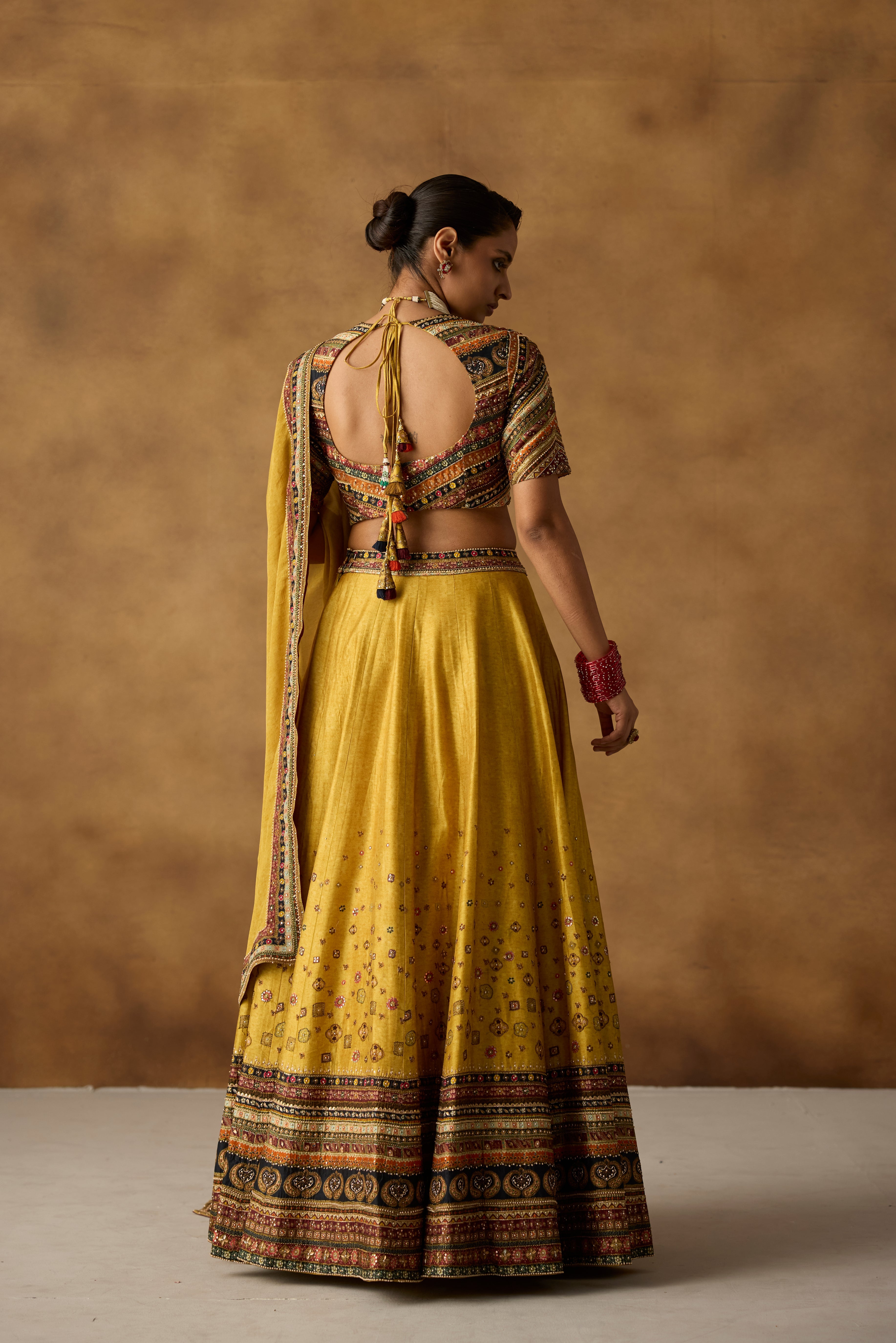 Mustard Yellow Embellished Dola Silk Lehenga Set