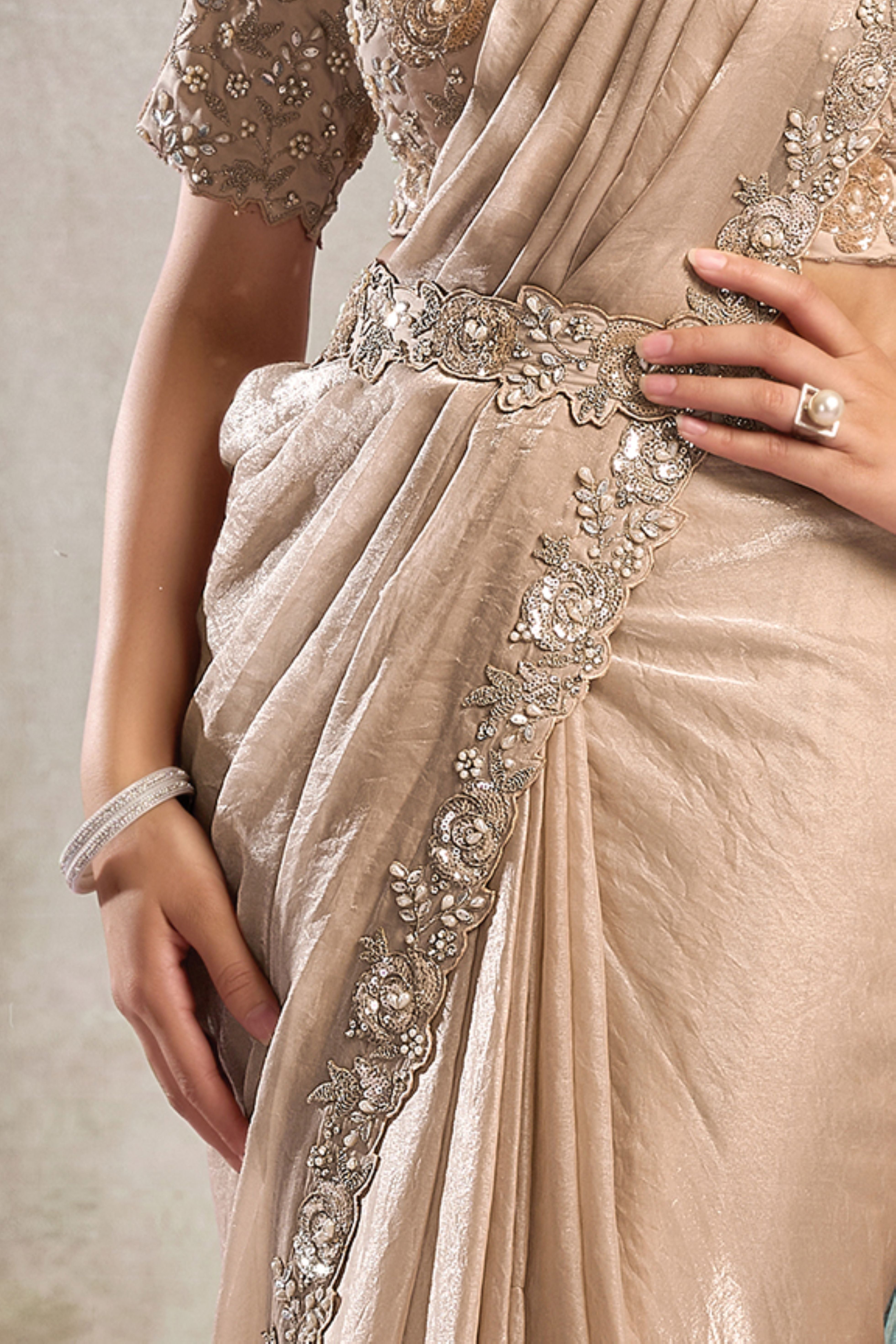 Warm Ecru Embellished Satin Silk Draped Saree