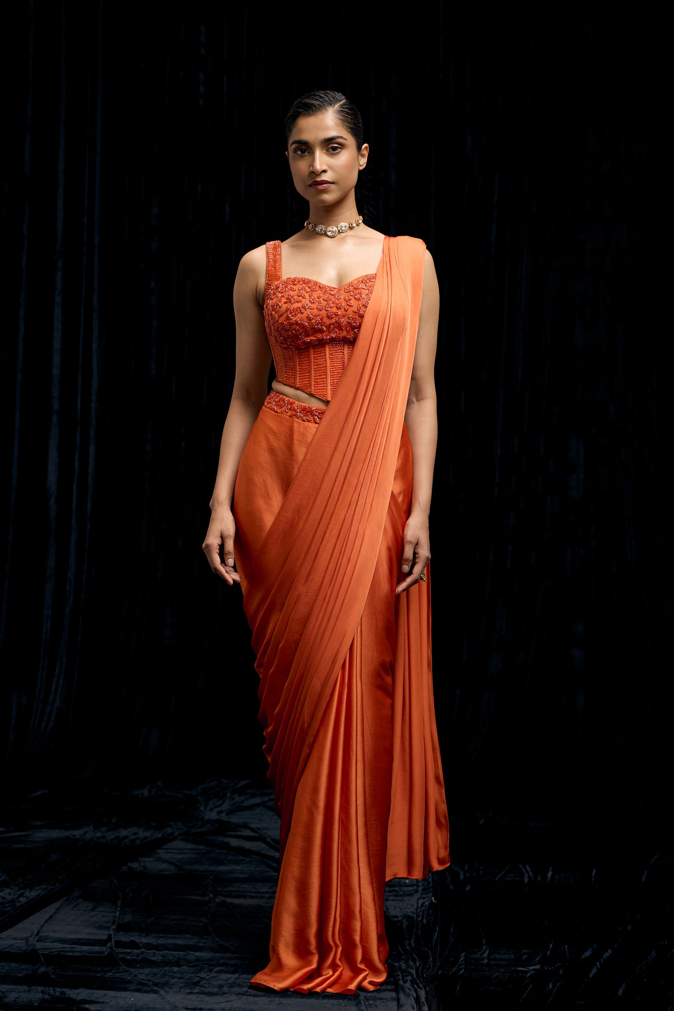 Saffron Orange Embellished Satin Silk Draped Saree