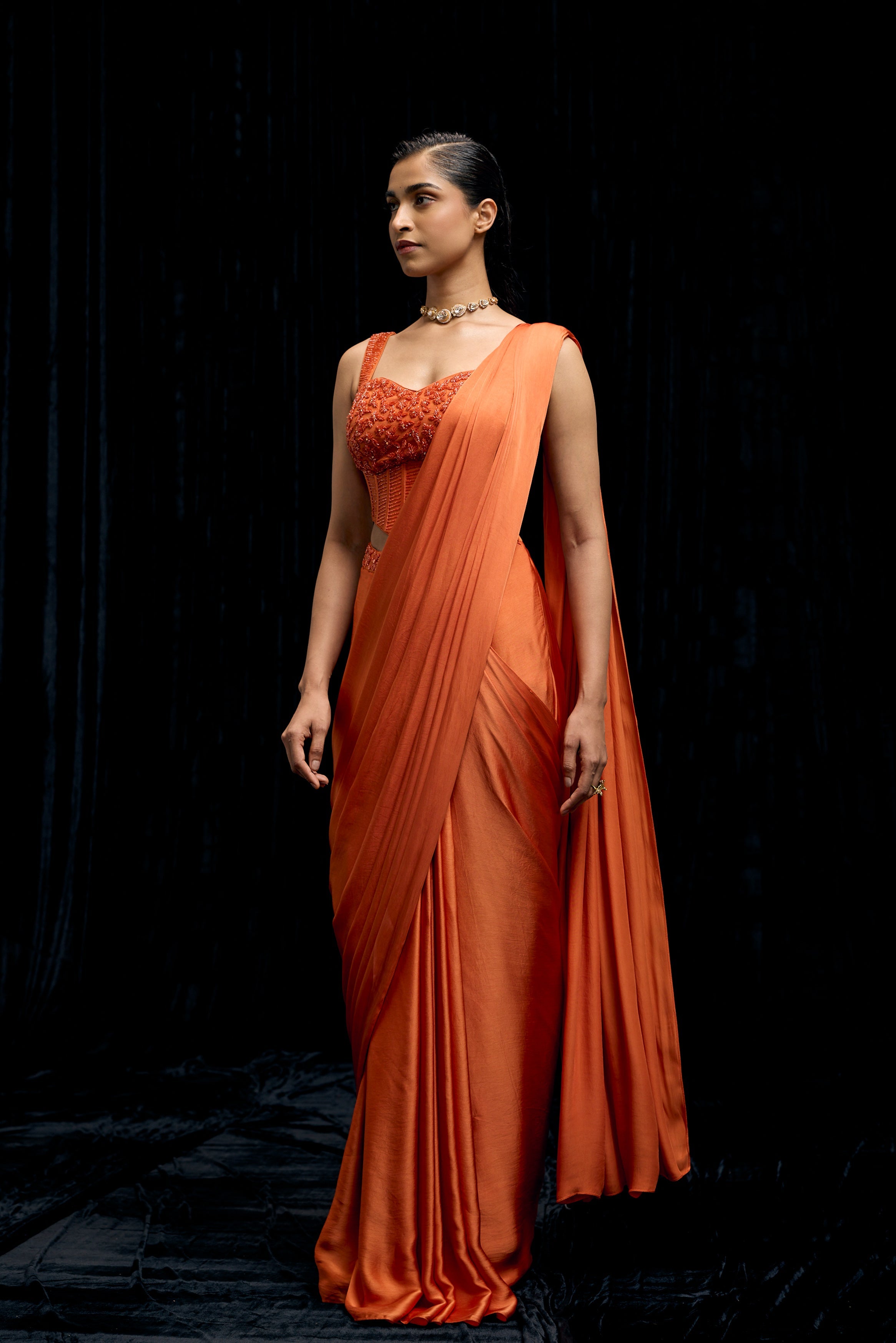 Saffron Orange Embellished Satin Silk Draped Saree