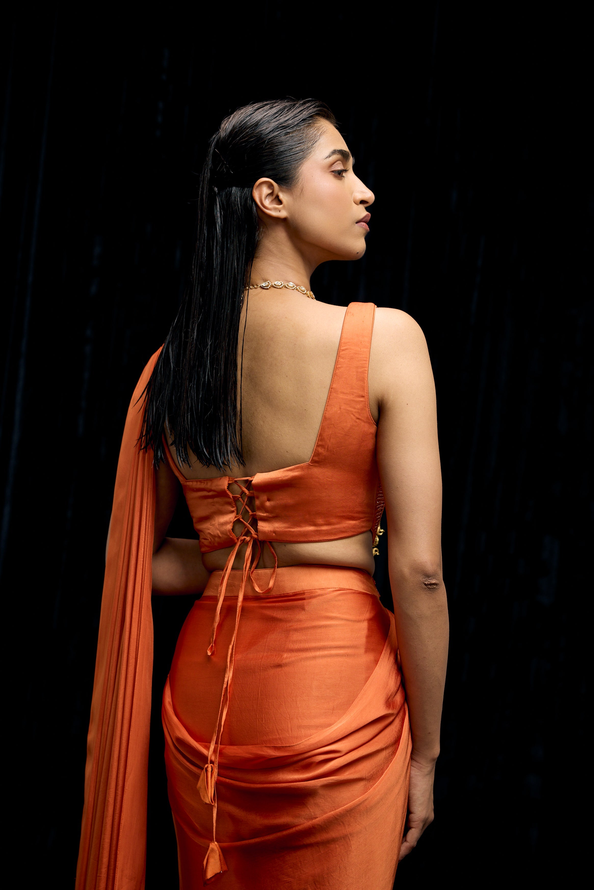 Saffron Orange Embellished Satin Silk Draped Saree