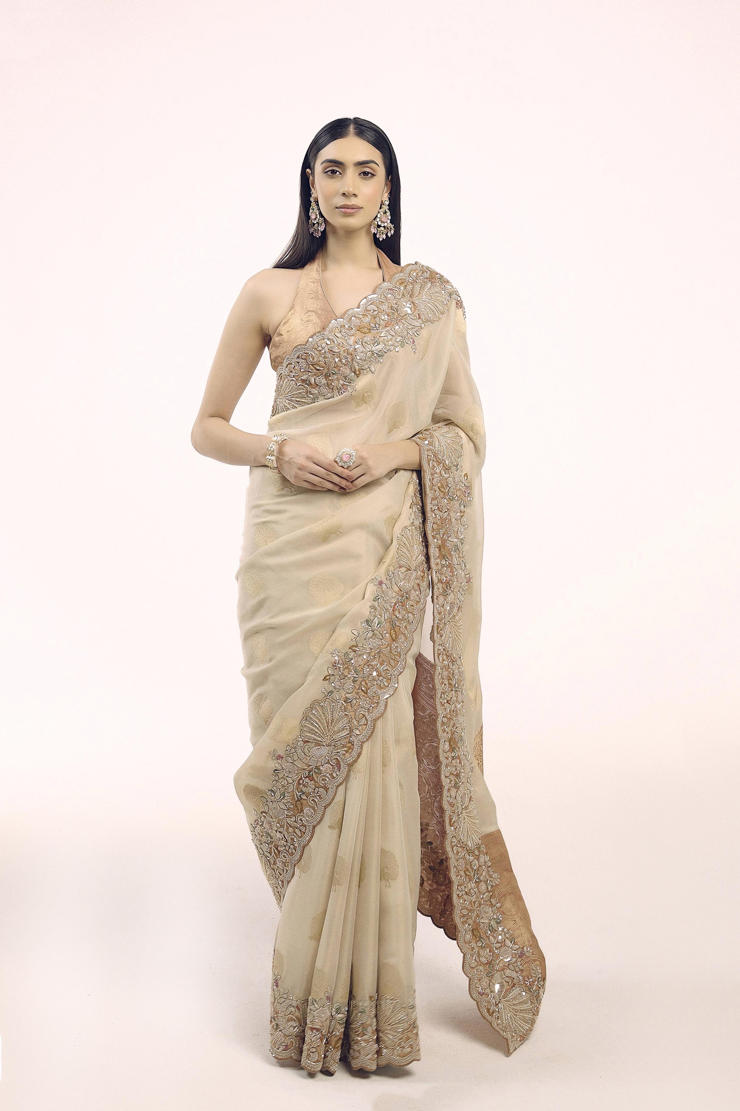Bright Beige Embellished Premium Silk Saree