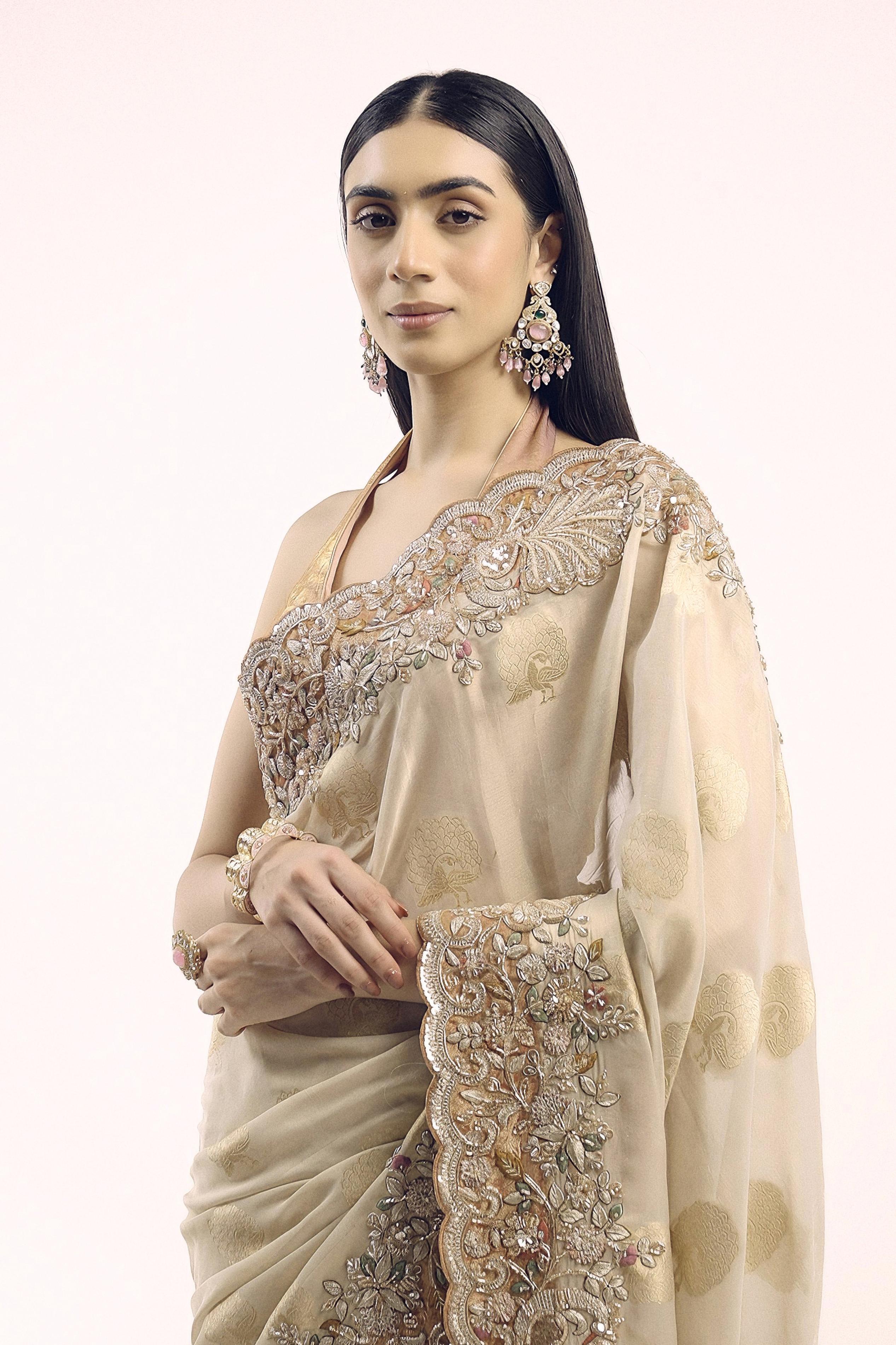 Bright Beige Embellished Premium Silk Saree