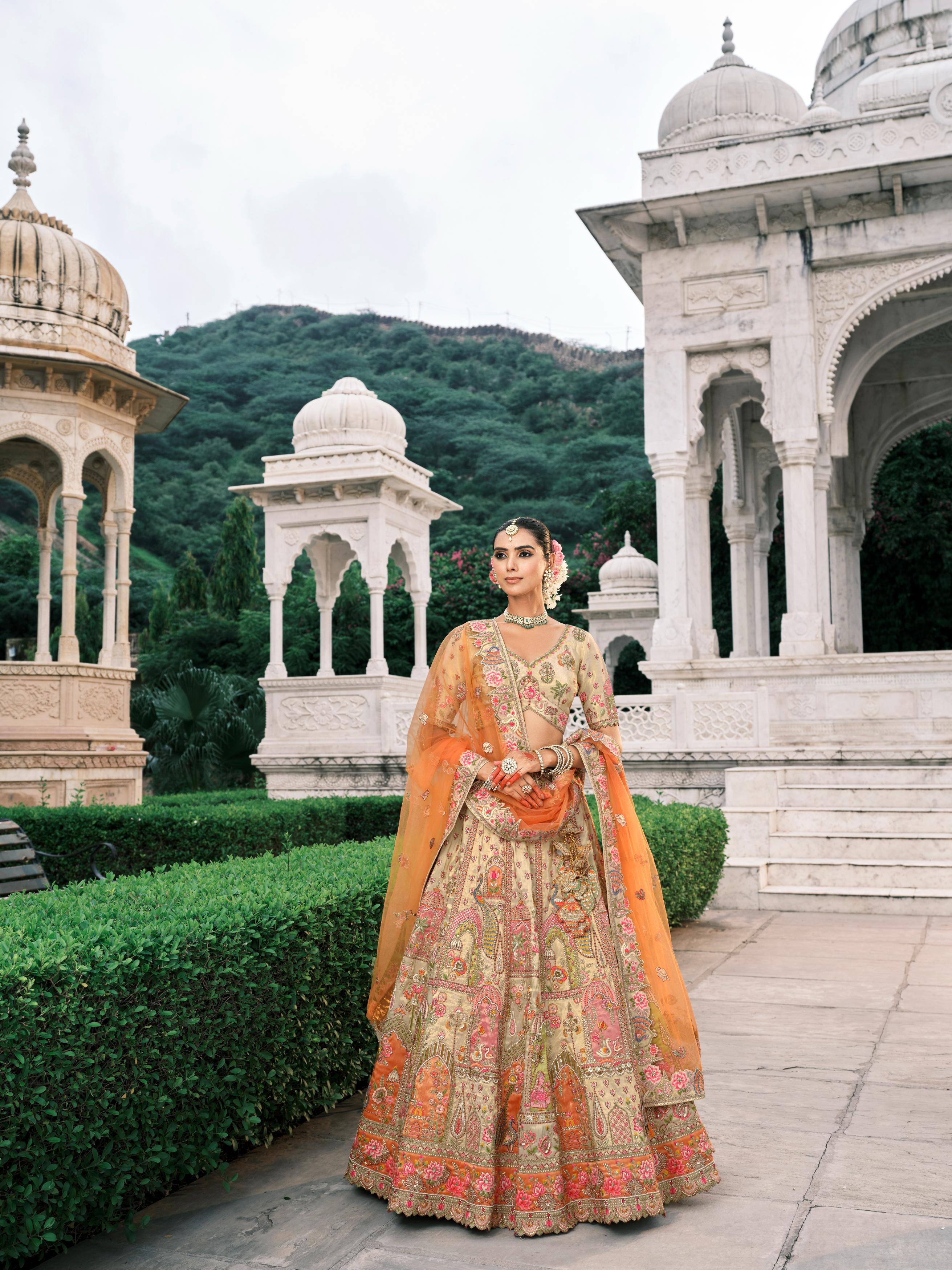Cream Multicolour Handwork Shimmer Tissue Silk Embellished Lehenga Set