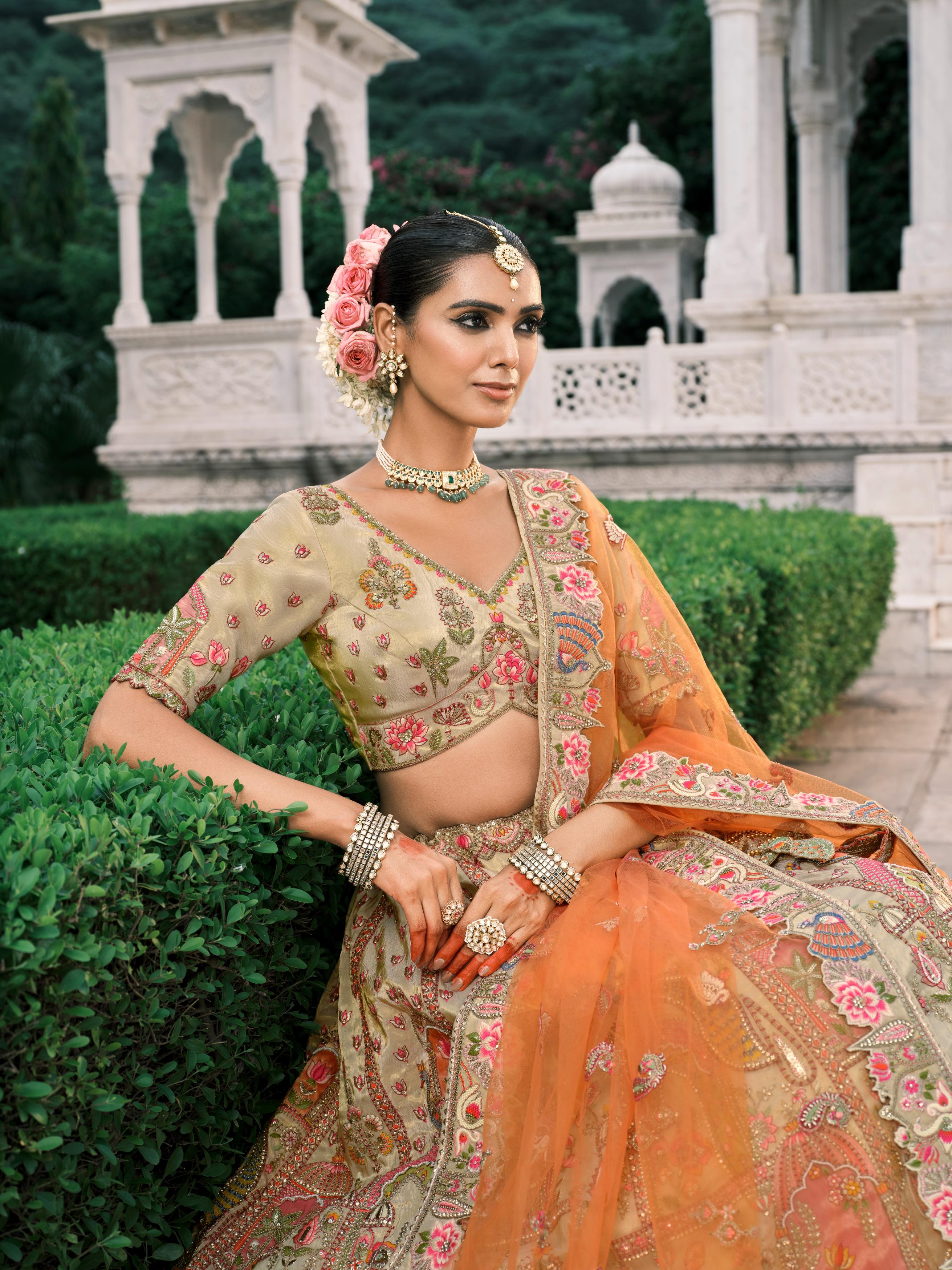 Cream Multicolour Handwork Shimmer Tissue Silk Embellished Lehenga Set