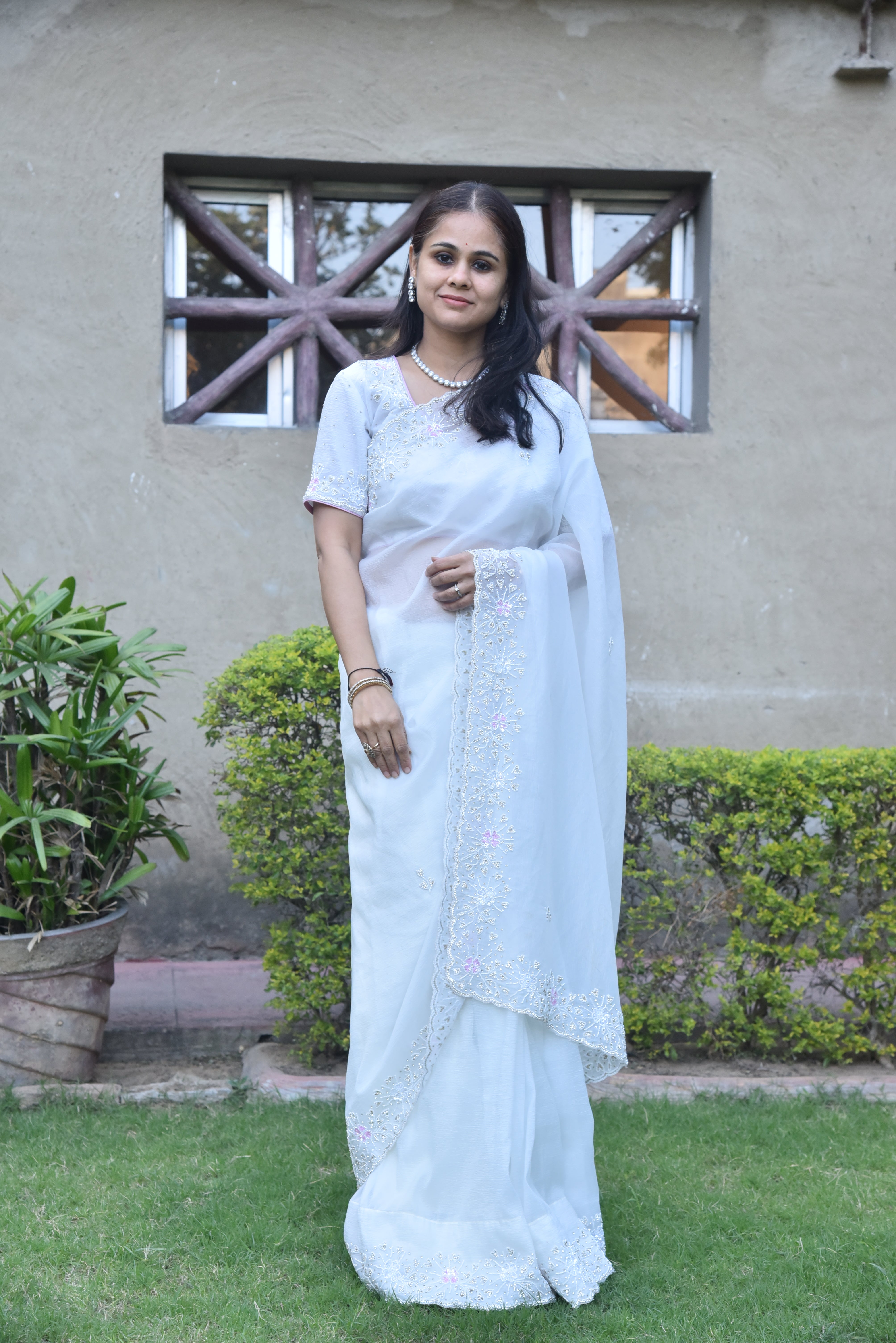 Regal White Embellished Chiffon Silk Saree