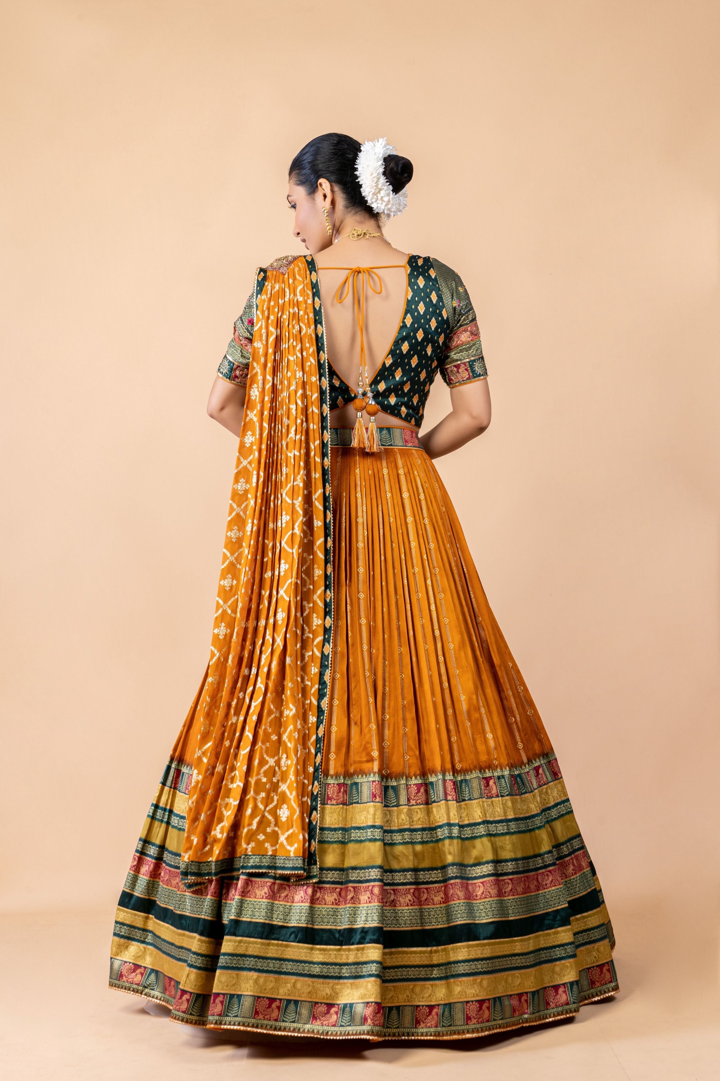 Mustard Embellished Brocade Silk Lehenga Set