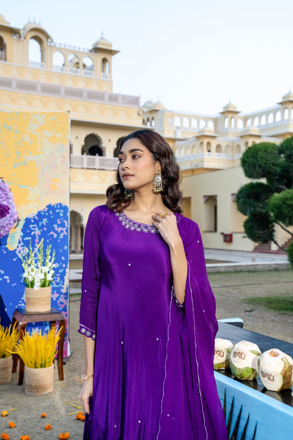 Purple Embellished Asymmetrical Kurta Set with Potli bag